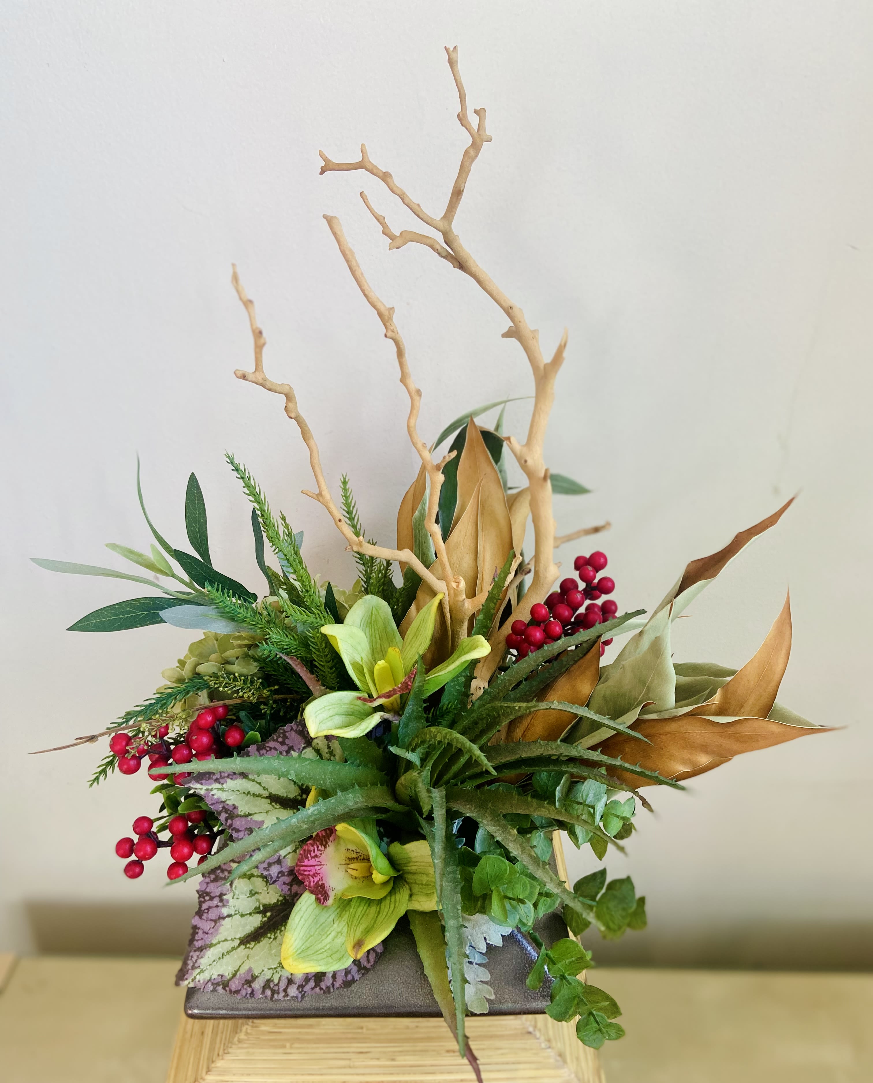 Trendy Gift - Stylish Permanent arrangement in low ceramic container with silk, natural wood &amp; dry elements.  High quality materials keep this composition looking natural &amp; beautiful with no maintenance. Great gift or home decor. 18”tall &amp; 15”wide.