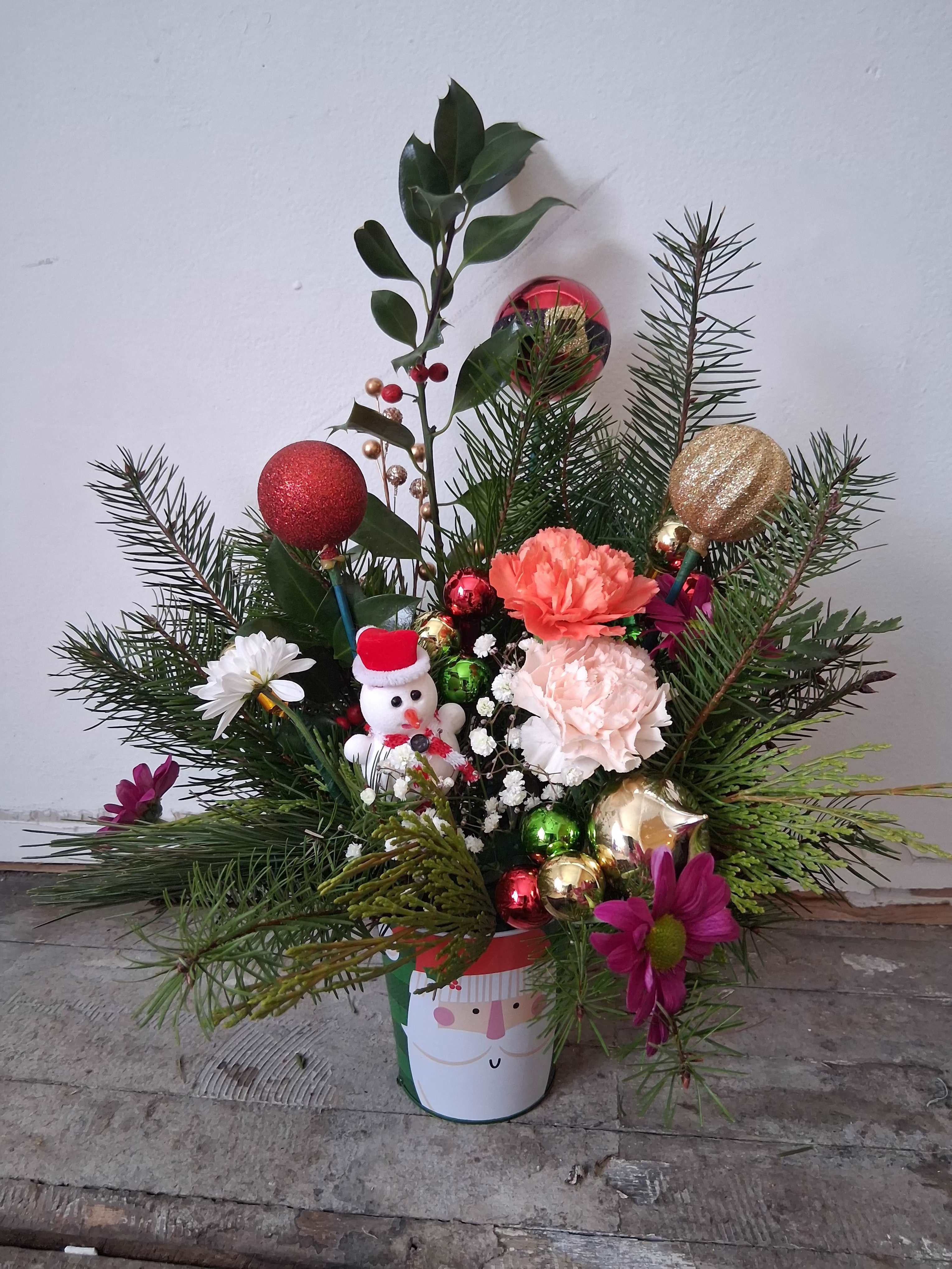 "Dear Santa" - Cute mini Santa bucket with assorted Christmas greens, ornaments and flowers.