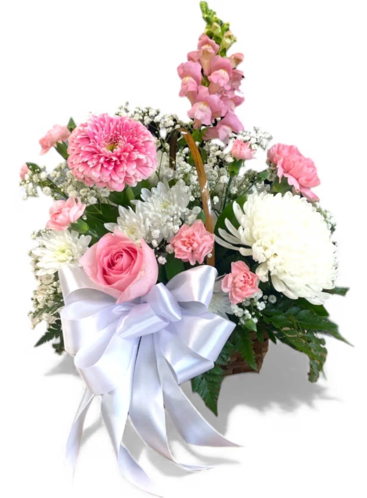 Pink &amp; White Delightful Basket - Crafted with love and attention to detail, this exquisite arrangement features a perfect harmony of soft pinks and crisp whites, symbolizing grace, purity, and affection.  Adorned with lush pink roses, delicate white chrysanthemums, charming pink carnations, and sprigs of baby's breath, this basket radiates elegance and warmth. Held together with a luxurious white satin ribbon, Perfect for expressing sympathy or an ideal gift for birthdays, anniversaries, or simply to brighten someone's day. 