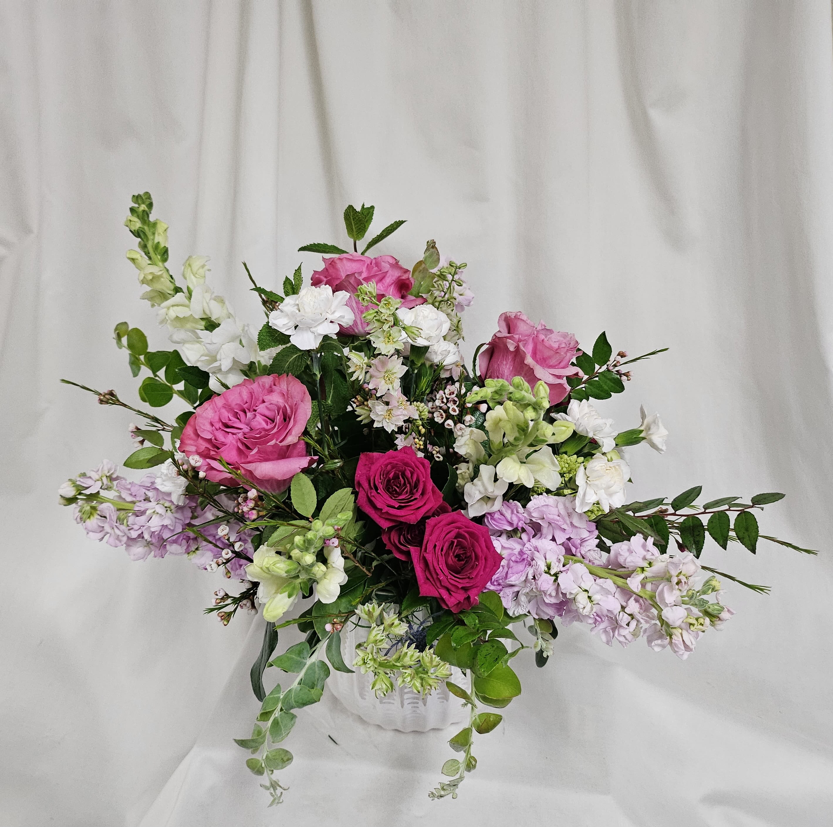 Deborah's Garden - Lavender and Pink  blend of premium  roses and garden must haves complete this medium sized bouquet with a "fruity" fragrance that fills any room.