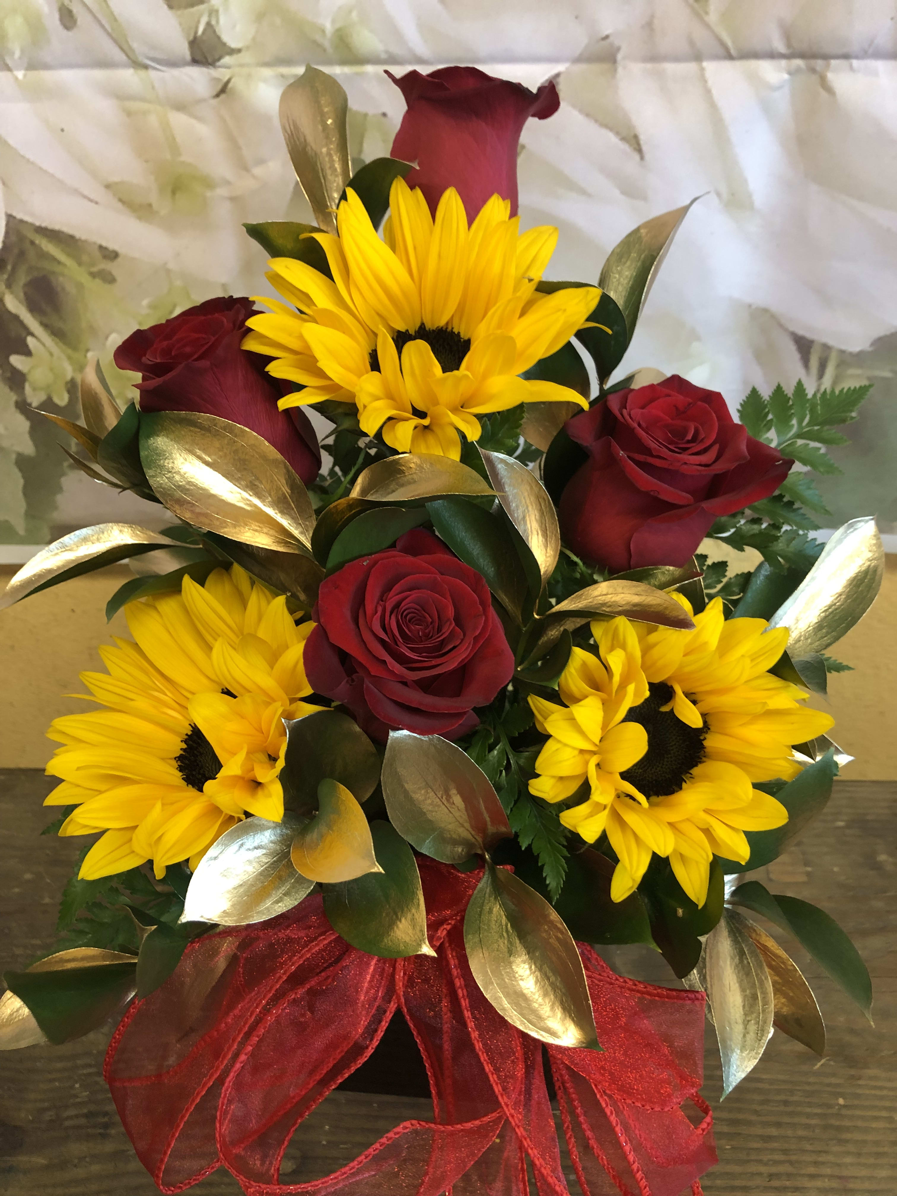 Happy Cube - Roses and Sunflowers arranged in a cube with gold ruscus as filler