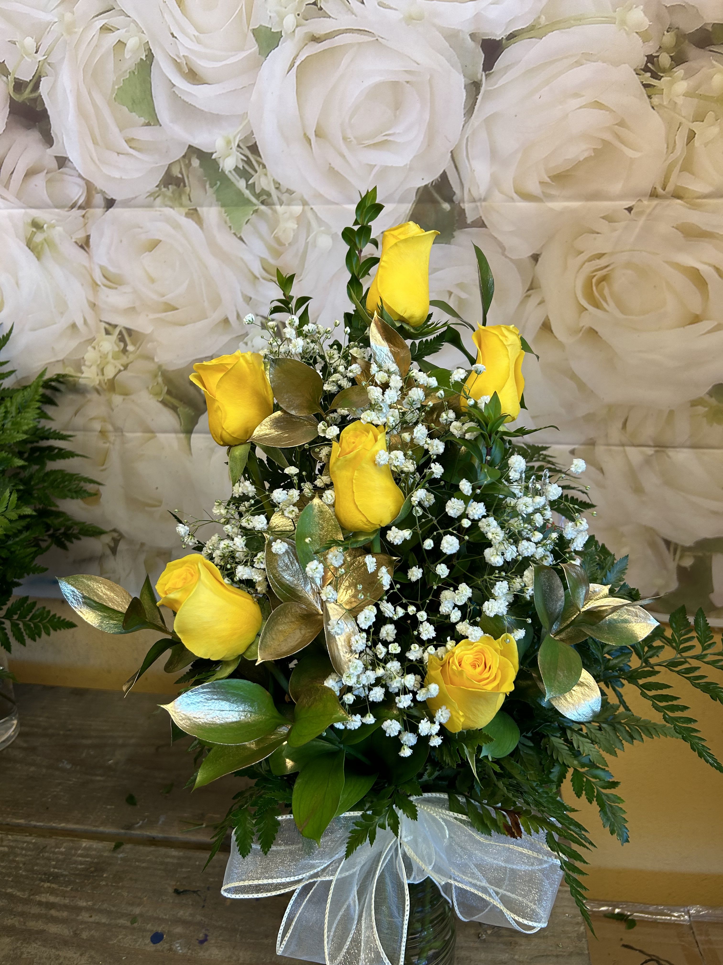 6 YELLOW ROSES IN A VASE - 6 YELLOW ROSES IN A VASE WITH GOLD RUSCUS LEAVES AND BABY BREATH.  
