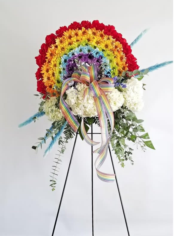 Rainbow Standing Spray - Flower are subject to substitution and availability.  24 Hour notice needed. 