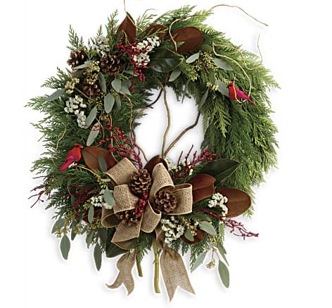 Rustic Holiday Wreath - A burlap ribbon and spray of red berries brings a festive touch to this beautifully rustic flat cedar wreath. The perfect addition for your holiday decor! This wondrous wreath includes flat cedar, curly willow, seeded eucalyptus, and magnolia leaves.
