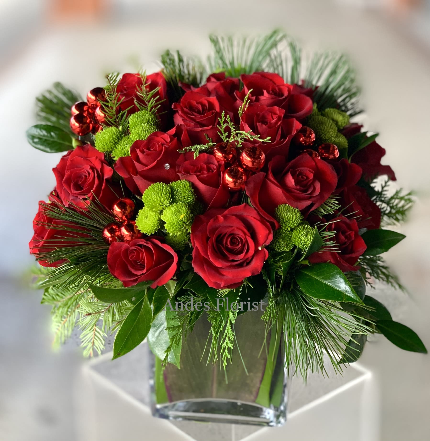 Warm Winter By BloomNation™ - Winter makes us appreciate warmth. Scarves, sweaters, and blankets make us feel warm and fuzzy in a way that just can’t be replicated in other seasons. Bring an extra layer of warmth into your life this winter with the Warm Winter arrangement. Note: this arrangement is not a substitute for a space heater. 