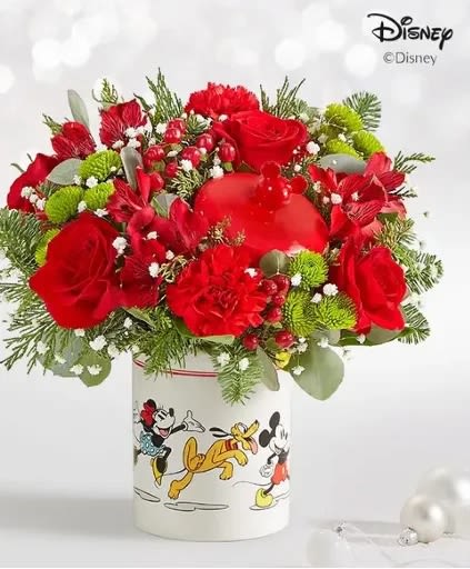 MICKEY MOUSE COOKIE JAR - Share a holiday surprise full of character(s)! Part of our exclusive Disney collection, this handcrafted bouquet is gathered in joyful Christmas colors and designed in our whimsical Mickey Mouse and Friends cookie jar, featuring iconic animations of the whole gang. Great as a keepsake container or to keep your favorite treats, it’s a sweet and nostalgic surprise for every Disney fan.