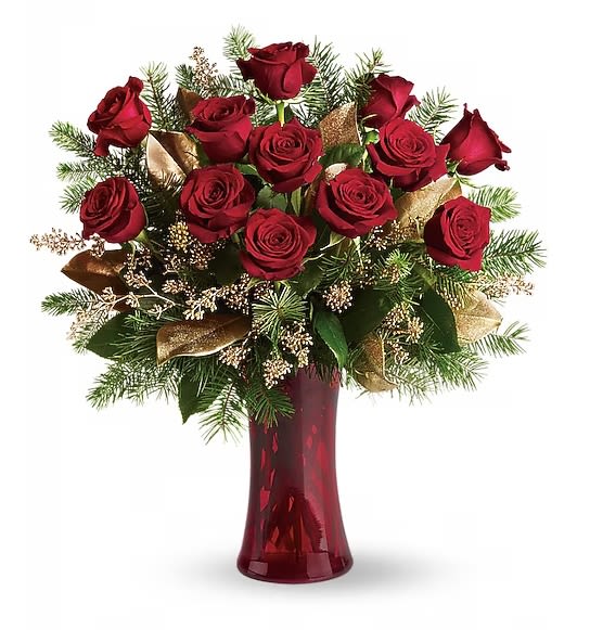 Christmas Dozen roses - Dazzling and delightful. A dozen red roses make a dashing holiday gift, especially when they are arranged with brilliant holiday touches and delivered in a ruby red vase. Twelve beautiful rose blossoms mix with salal, eucalyptus and golden fir branches in a radiantly red glass vase.