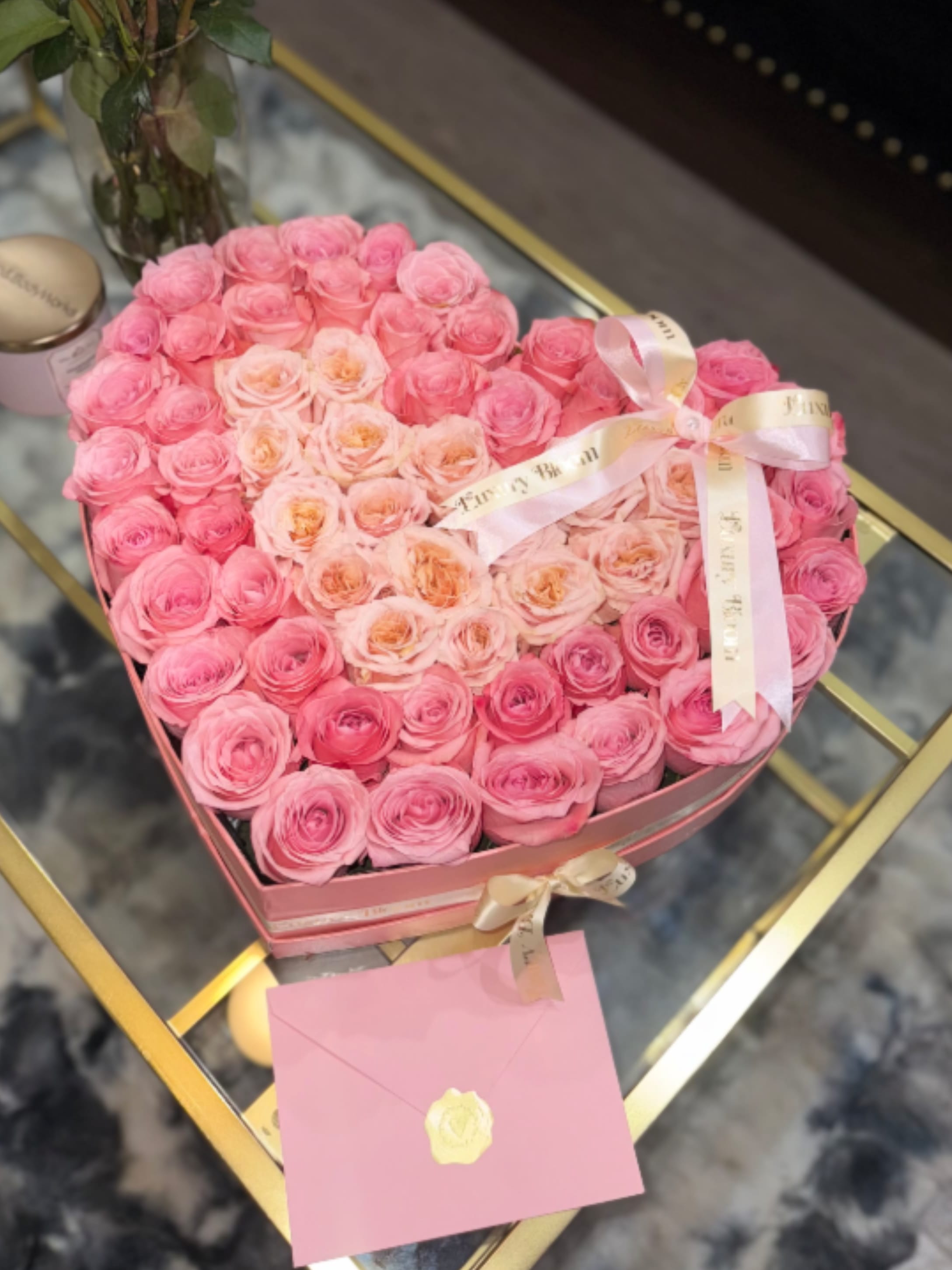 Pink heard  - A sophisticated heart-shaped design crafted with 75 fresh, carefully selected roses and presented in a premium box. Each arrangement is handcrafted with exceptional attention to detail, created to express love, admiration, and meaningful moments. Perfect for anniversaries, special occasions, or heartfelt statements that deserve elegance. Same-day delivery available in Miami