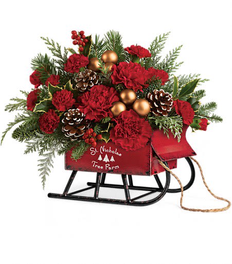 Sleigh Bouquet - Delivered in a stylish white sleigh, this lush mix of fresh flowers and winter greens delivers classic Christmas style!