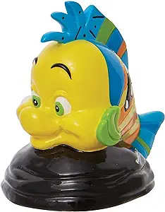 DISNEY- Britto Collection -The Little Mermaid - Flounder - With bold color and compelling pattern, contemporary artist Romero Britto captures the fun and whimsy of Disney. Redesigning the friendly fish from The Little Mermaid, Flounder gets a new set of spectacular scales. 2.3" H Calcium Carbonate Polyresin Imported