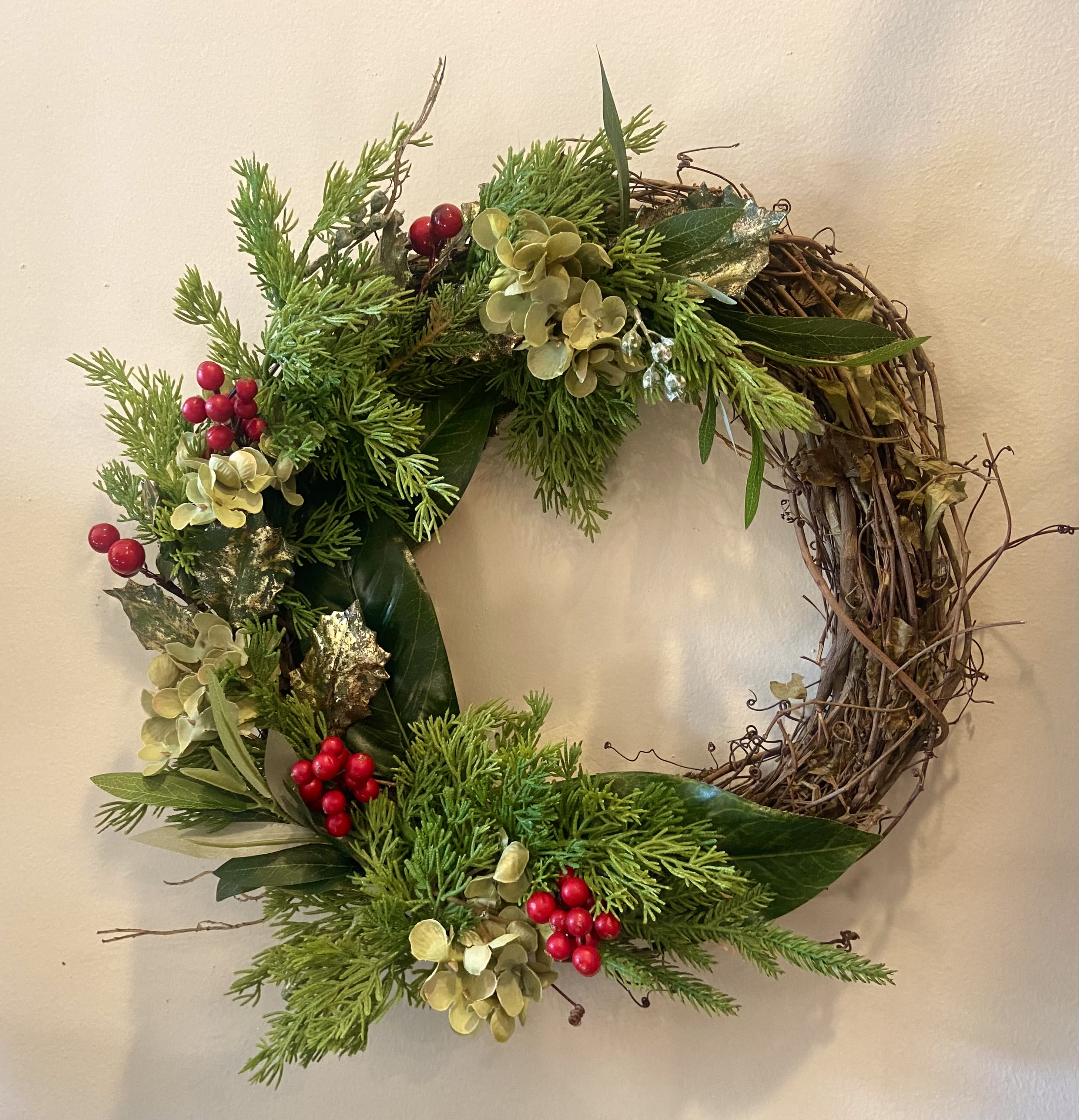 Holiday Keepsake - Forever keepsake - Natural grapevine wreath with silks that look so natural!! Winter greens, magnolia, hydrangea &amp; berries.  15” diameter can be used on wall or table centerpiece with hurricane candle. 