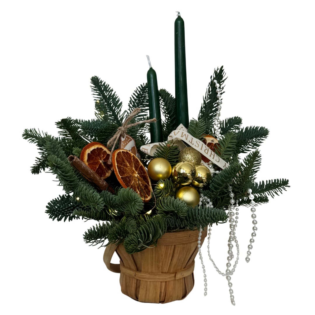 Candlelit evergreen - A cozy holiday centerpiece made with fresh fragrant evergreen, paired with tall green taper candles, gold ornaments, and warm fairy lights for that “instant Christmas” vibe. Finished with dried orange slices + cinnamon for a subtle seasonal scent and a touch of elegant sparkle. Perfect for dining tables, entryways, or gifting. Includes fairy lights!