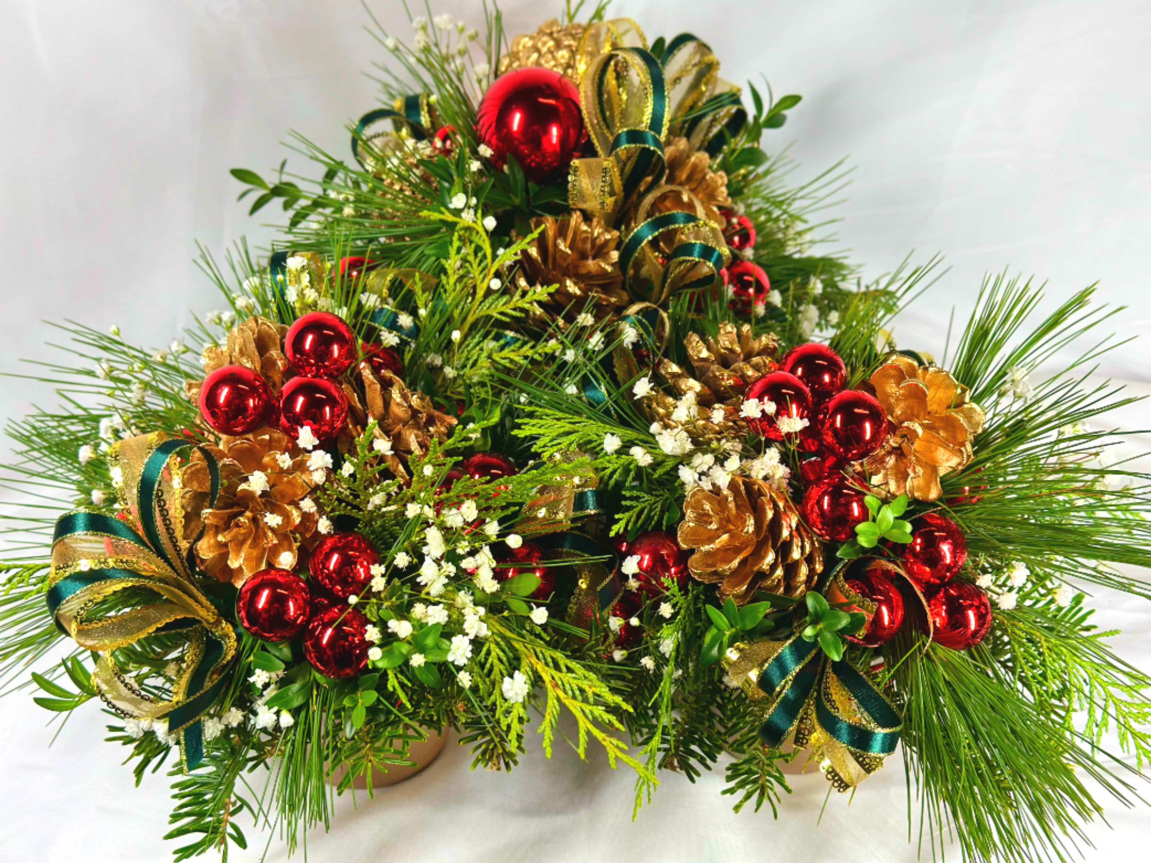 Christmas Tree-O - This delightful design is actually three festive holiday arrangements in one!  Each gold hued terra cotta pot features all the greens of a Christmas Tree along with festive ribbons and decorations. The center pot is approximately 10 x 10", and the two smaller designs are about 8 x 8" each. These would make a fabulous Christmas centerpiece, or look lovely individually displayed around a home. These are sold as a set of three.