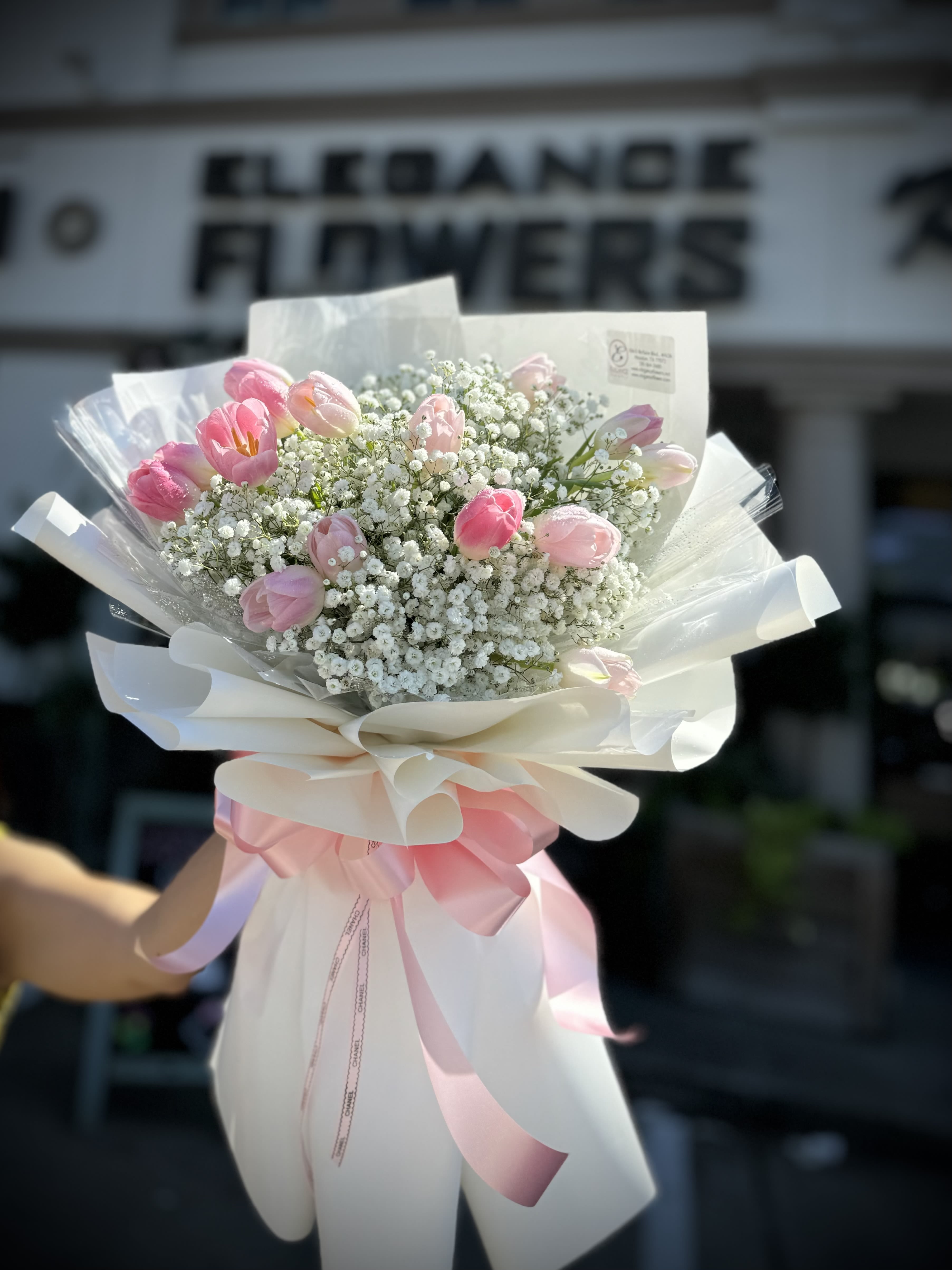 Wrapped Bouquet #20 - A wrapped bouquet of flowers is a beautifully arranged collection of blooms, carefully selected and elegantly wrapped in decorative paper or fabric. Wrapped bouquets are perfect for any occasion, from expressing love and gratitude to celebrating special moments, offering a thoughtful and visually stunning gift. 