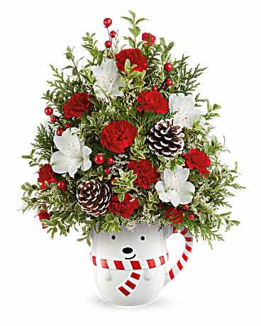Send A Hug® Snowy Lane Tree - Teleflora's Send A Hug® Snowy Lane Tree is a festive floral Christmas tree bursting with white alstroemeria, red blooms, and winter greens. Arranged in Teleflora's Cozy Cub Wish Mug, it's a cheerful holiday surprise.