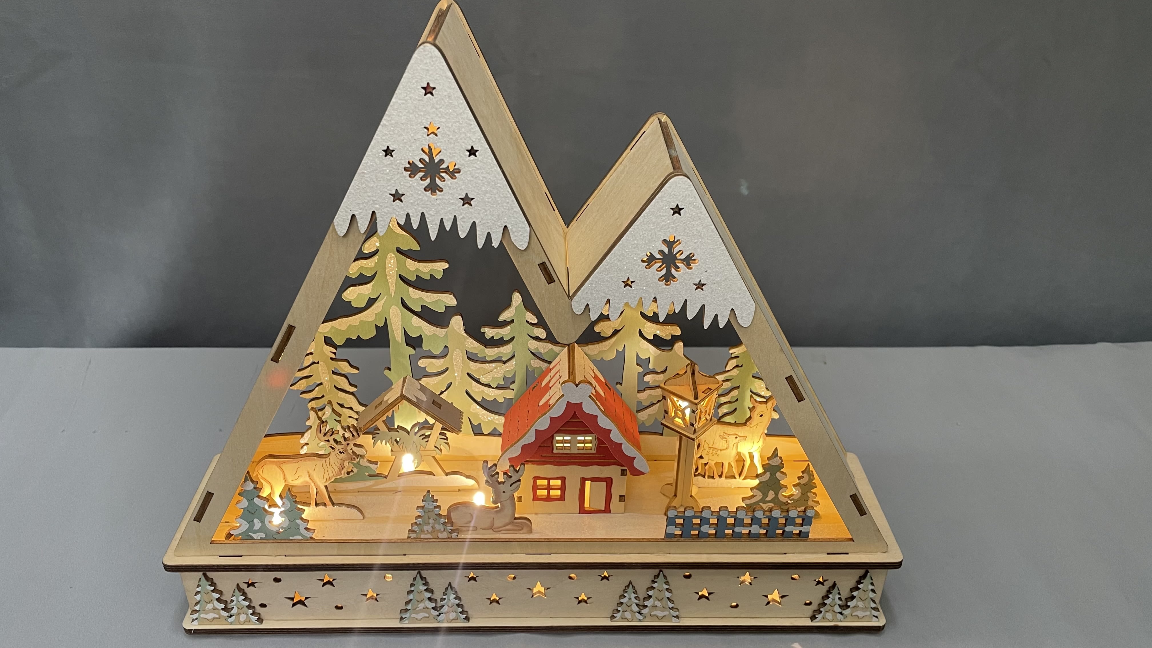 Holiday House - Let the charm of warm memories and wintry scenes fill your holidays. Experience the enchantment of this sweet Christmas decor