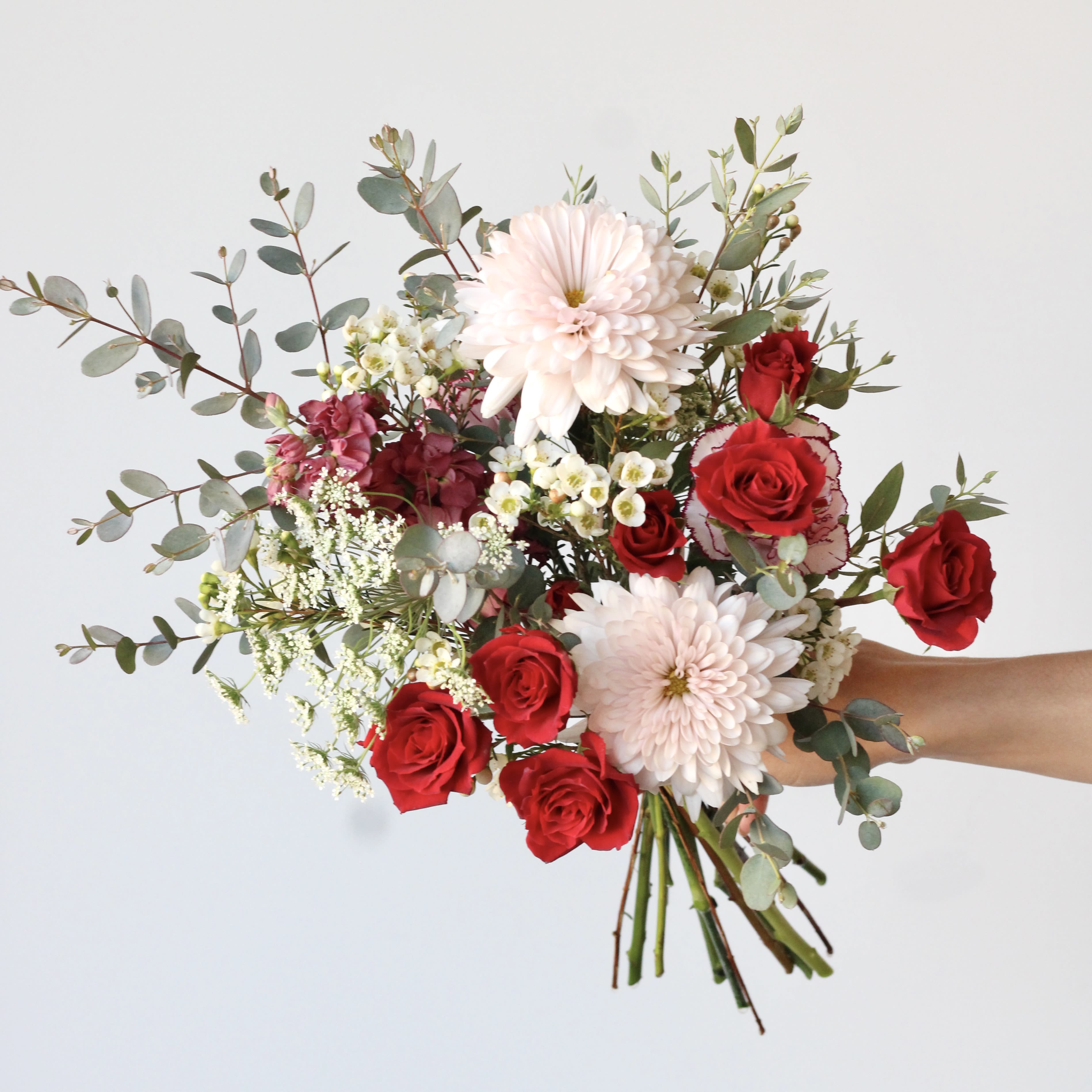 Designer's Choice Bouquet -Everyday - Designer's Choice Everyday Bouquet, Grab n Go. In Studio only. These small bouquets are thoughtfully arranged with fresh, seasonal blooms chosen by our designers. Perfect for a quick gift or a little something just because. Pricing includes a wet wrap, paper wrap, and ribbon.