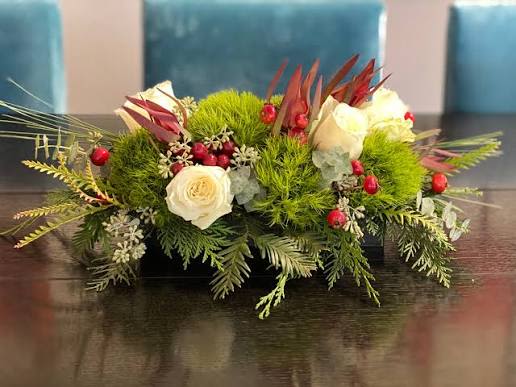 Christmas Centerpiece  - Looking for that perfect christmas centerpiece? Look no further, we have you covered! Order one of our beautiful Christmas designer’s choice arrangements today! 