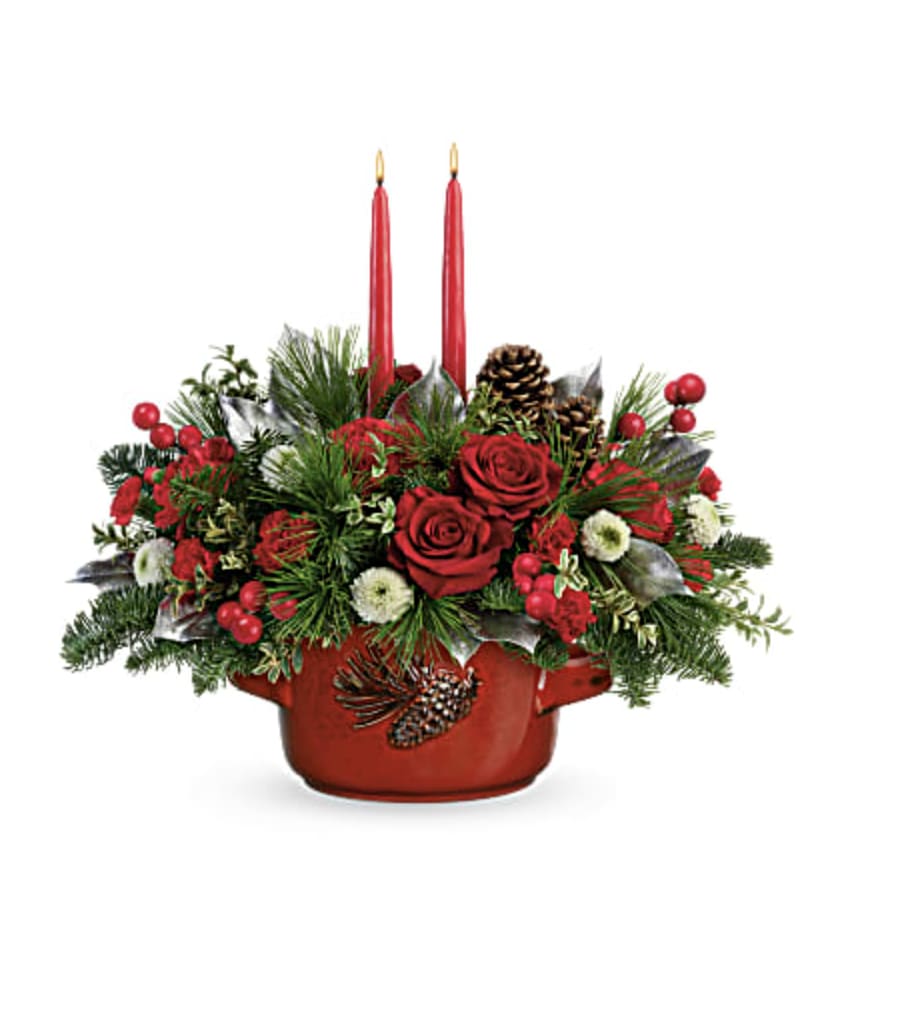 Christmas Heirloom Centerpiece - This heirloom-quality, food-safe serving dish is adorned with charming hand-painted pinecones and an elegant Christmas rose bouquet that sparkles with tapers and shimmering ornaments. Red roses, red carnations, miniature red carnations and white button spray chrysanthemums are arranged with noble fit, white pine, oregonia and lemon leaf. Delivered in a Vintage Stoneware Bowl.