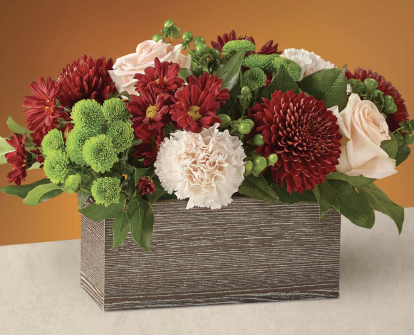 Spiced Wine - A weathered Wooden box with Cream and Rust Seasonal Blooms  