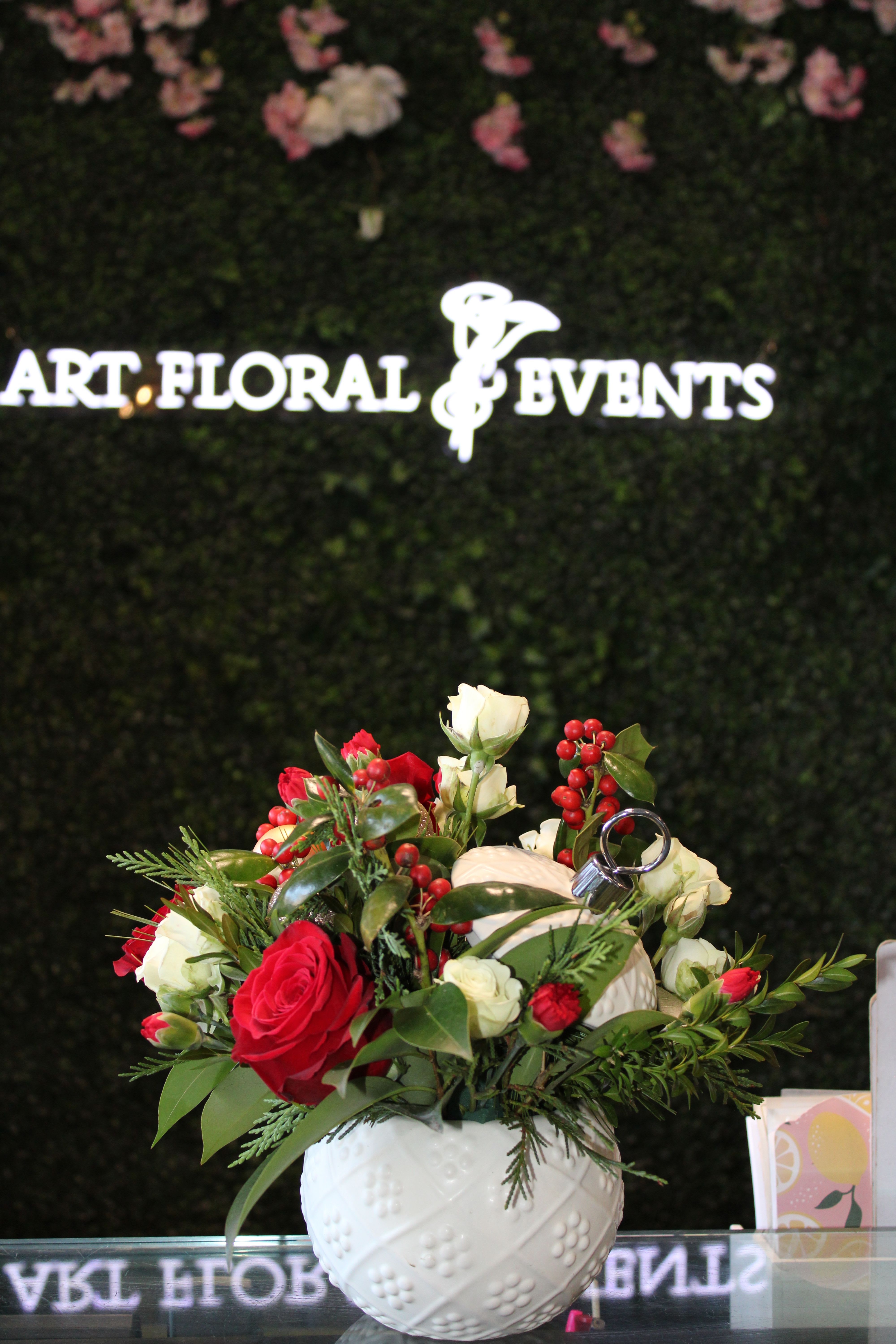 Christmas Ornament  - Red Roses, White Spray Roses, Mini red Carnations, Holly, White Ceramic Ornament Container