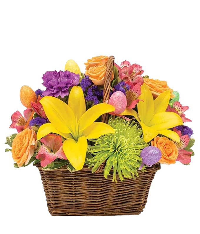 Easter Egg Surprise Basket  - Especially reminiscent of the time honored Easter Tradition- the Easter egg hunt- this gorgeous basket is sure to bring your recipient back to a better time! Not only does this basket contain the colorful eggs that you would expect this time of the year, but also a stunning array of seasonal flowers. 