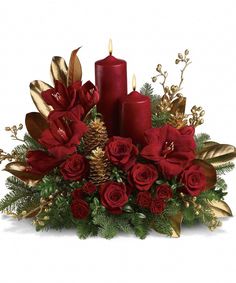 Christmas by Candlelight - Christmas by candlelight is the perfect way to delight in the warmth and joy of the season. This elegant arrangement will be at home anywhere in the house. A perfect centerpiece for a medium to large tablescape. 