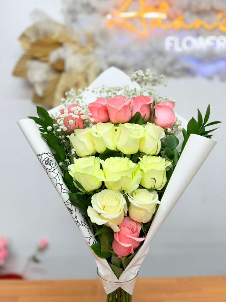Big Color - Elegant bouquet of fresh pink and white roses, beautifully arranged to convey sweetness, harmony, and timeless elegance. Perfect for any special occasion