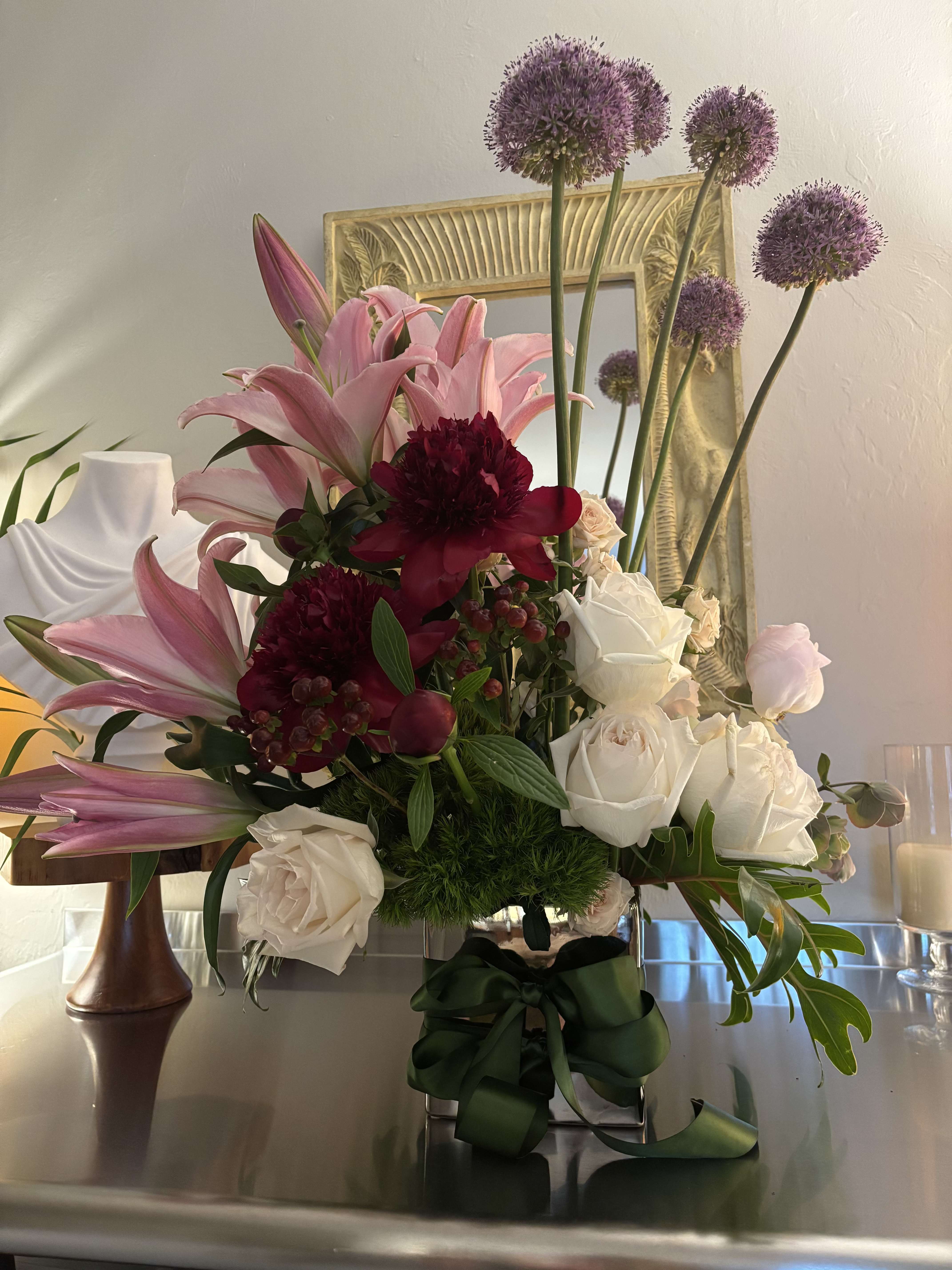 Mom. - Spectacular arrangement with pink lilies, white roses and beautiful peonies.  