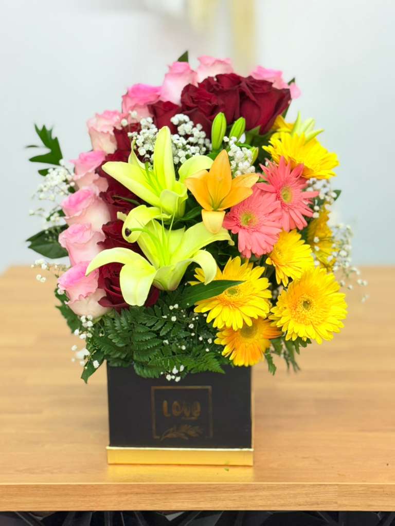 Pretty  big - Vibrant bouquet filled with a wide variety of fresh flowers in many colors, beautifully arranged to create a joyful, lively, and eye-catching display. Perfect for brightening any occasion.