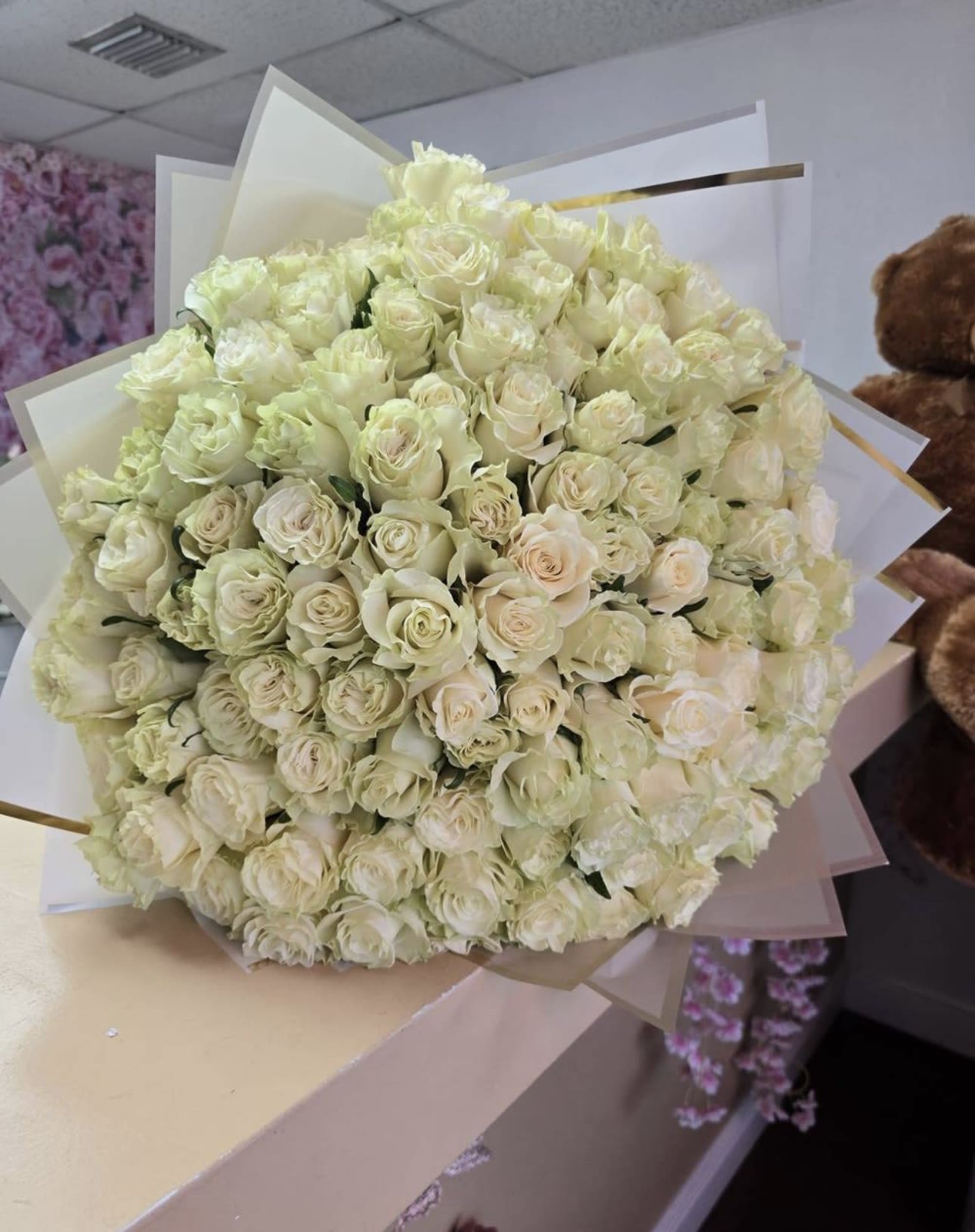 100 wrap white roses  - 100 white roses 