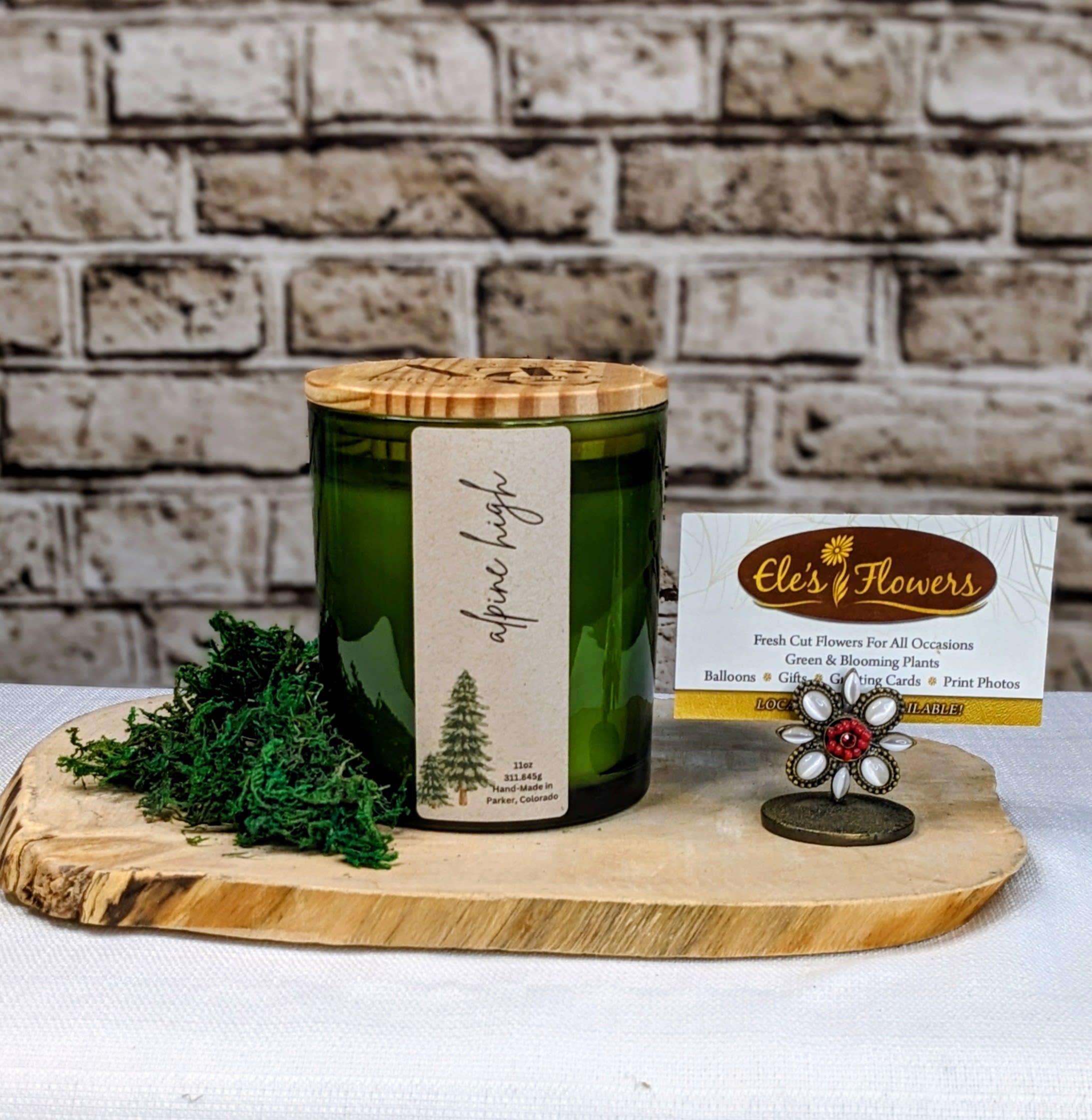 Alpine High - Candle - A winter wonderland scent. Great for the holidays with lots of mixed evergreens.   11 oz candle handmade with clean soy wax blend and a crackling cedar wood wick. Burns for up to 60-80 hours.  artistictouchcandleco.com