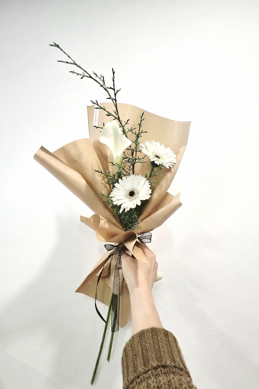 Holiday Mini Bouquet - - *Store Hours: Mon~ Fri: 10:00 a.m. to 6:00 p.m. Sat: 9:00 a.m. to 4:00 p.m. Sun: Closed  *Delivery: Deliveries occur roughly between 8am - 5pm. We are unable to offer further specific delivery windows or guarantee delivery times. but we will always do our best to accommodate requests. If your delivery address has a gate code number, please provide it for smooth delivery.  *PICK UP: Please try to time your pickup as close to the shop as possible to avoid congestion and ensure the freshness of your flowers. Thank you!  *Please note that your arrangement may vary slightly from the picture depending on the season and store stock, but we will match color schemes and guarantee it will be fresh &amp; beautiful.  Thank you