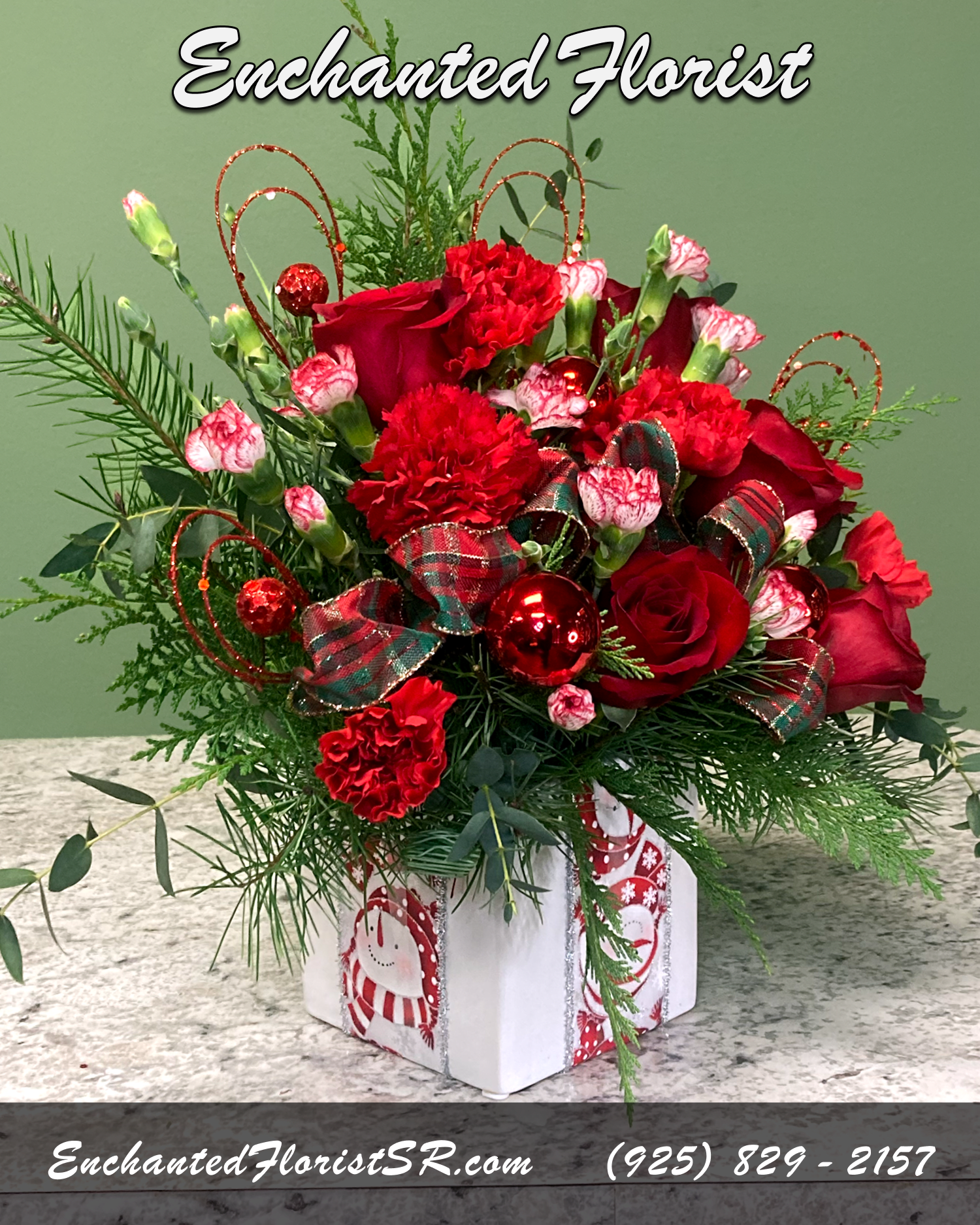 All Wrapped Up - Holiday Arrangement - Wrap them in love with this holiday mixed arrangement! Lush red Roses, classic red Carnations, freshly cut winter greens and a pristine white ceramic cube wrapped in a Christmas ribbon makes for a festive gift they'll long remember.  Arrives In: White ceramic cube vase  Orientation: One-Sided  Approximate Dimensions (Standard): Height: 10" Width: 6" Vase Diameter: 4"