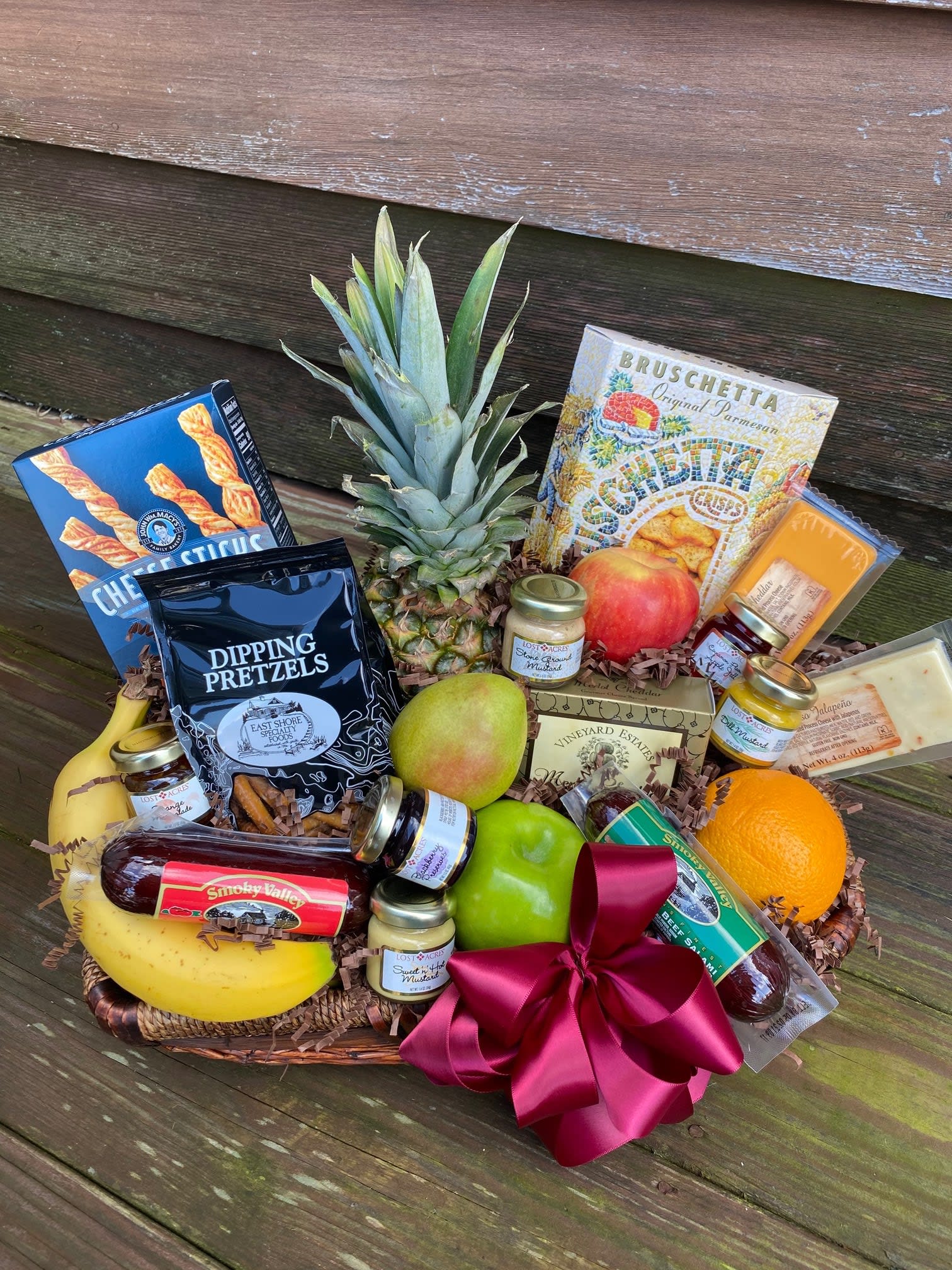 Gourmet Food Basket - Savory with Fruit - Food items will vary based off our currently inventory or artisanal  savory treats like meats, cheeses, pretzels, crackers, jams, jellies, chocolates and mustards. 3 sizes available - medium &amp; large sizes will include fruit. We will do our best to fulfill special requests within an appropriate time frame. 