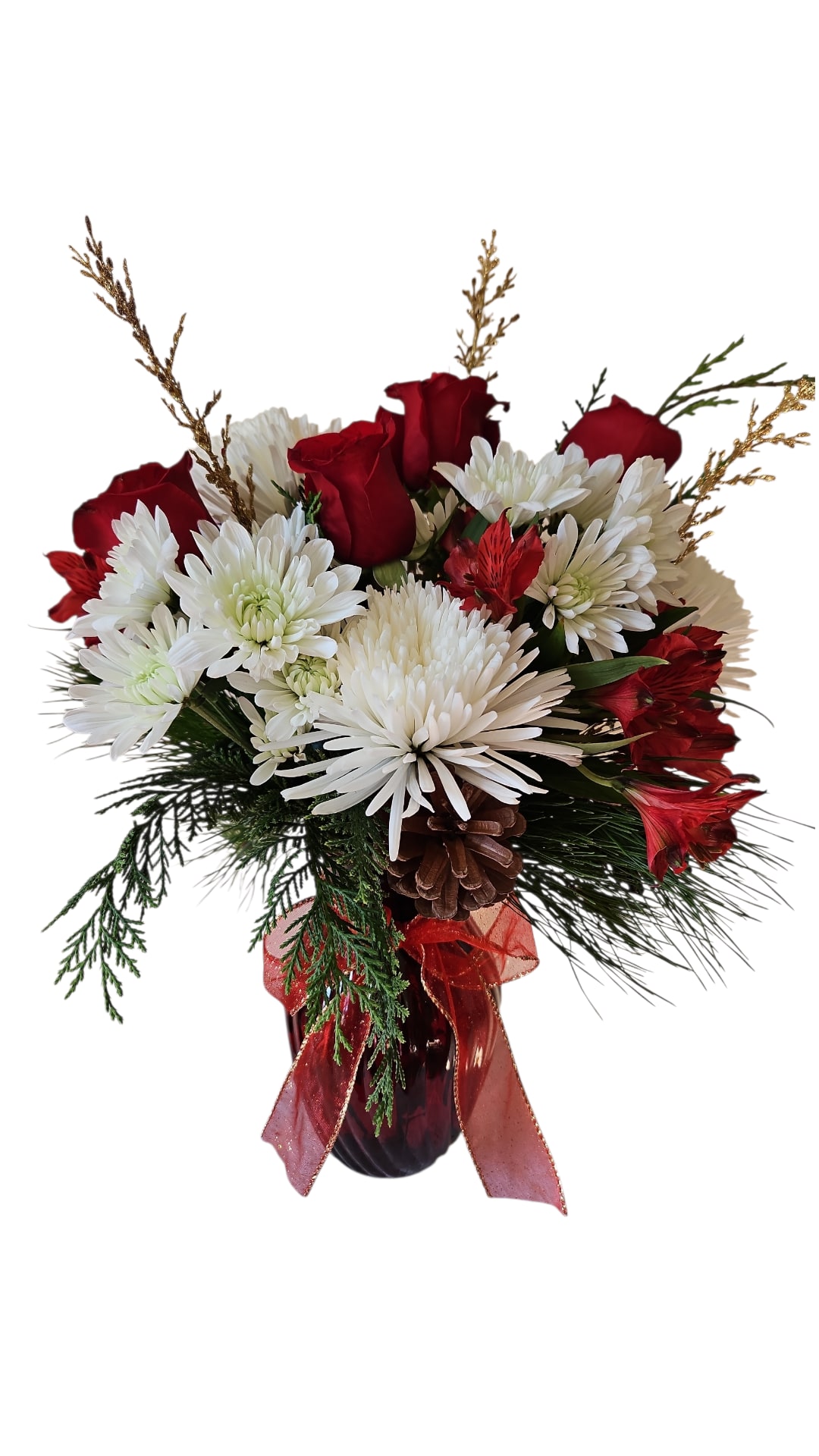 Christmas Wishes - Warm, festive, and full of holiday cheer, Christmas Wishes is a classic seasonal arrangement designed to bring the spirit of the holidays into any space. Styled in an 8-inch ruby red vase, this arrangement features rich red roses and red alstroemeria, beautifully paired with vibrant chrysanthemums accented in gold. Fragrant Christmas greens and a decorative pine cone complete the look, adding natural texture and cozy winter charm. Perfect for holiday gifting, seasonal décor, or spreading festive joy, Christmas Wishes is a timeless celebration of the season.