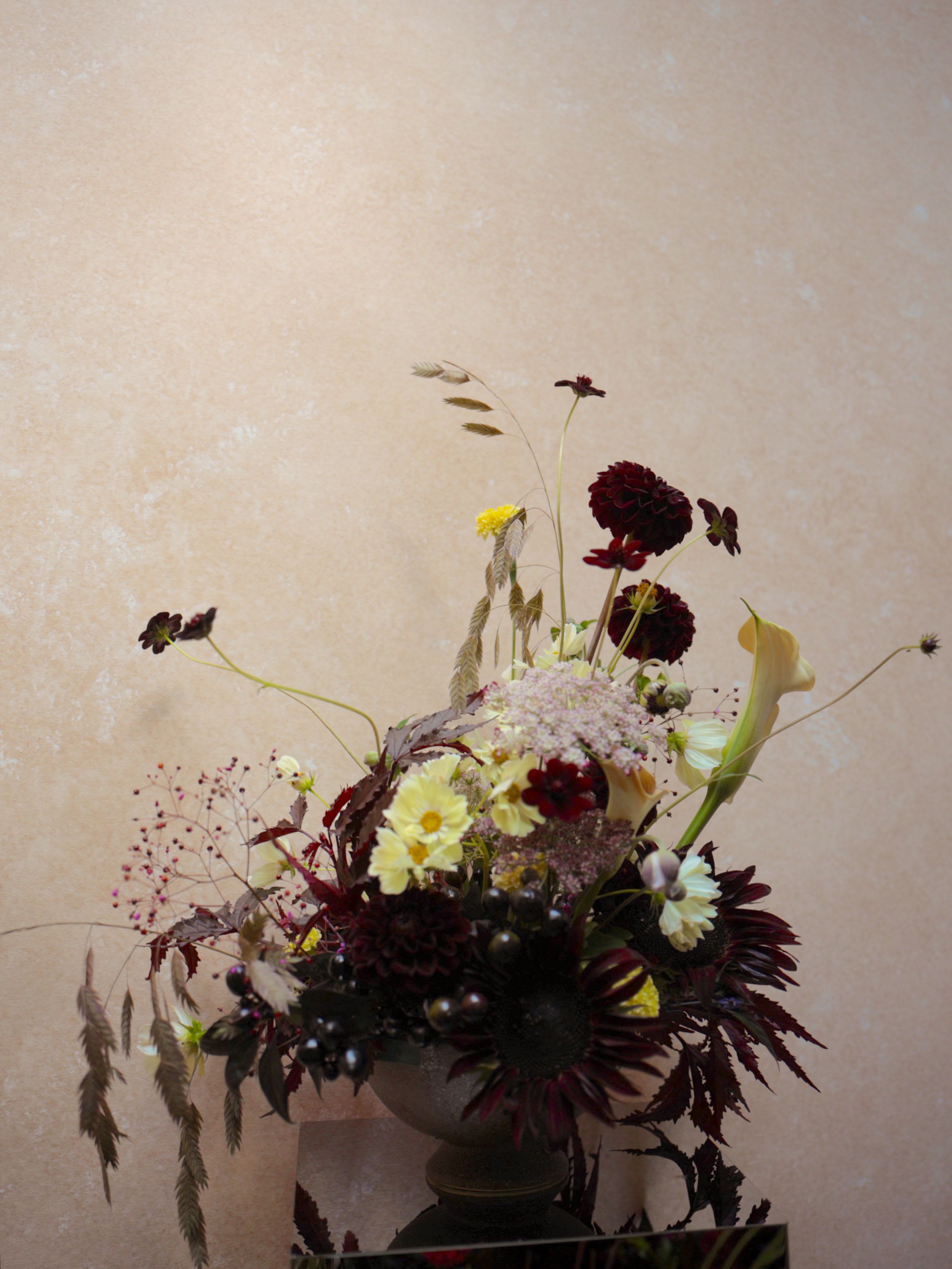 This city never sleeps - An arrangement inspired by the colors and lights of New York City at night, seasonal, fashionable, and earthy.  Thoughtfully designed in a ceramic vase, with flowers selected to reflect the natural rhythm of each season.