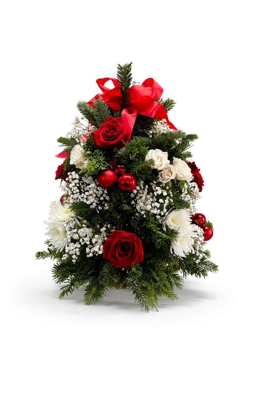 Winter Rose Tree - Winter Rose Tree is a classic holiday floral design crafted in a timeless tree silhouette, blending the warmth of tradition with refined elegance. Lush fresh evergreens form a full, structured base, accented with rich red roses, crisp white seasonal blooms, delicate baby’s breath, and festive red ornaments. Finished with a luxurious satin bow, this arrangement brings instant holiday charm to any space.  Perfect for entryways, dining tables, offices, or thoughtful seasonal gifting, the Winter Rose Tree is a beautiful way to celebrate the magic of the season with florals that feel both nostalgic and elevated.