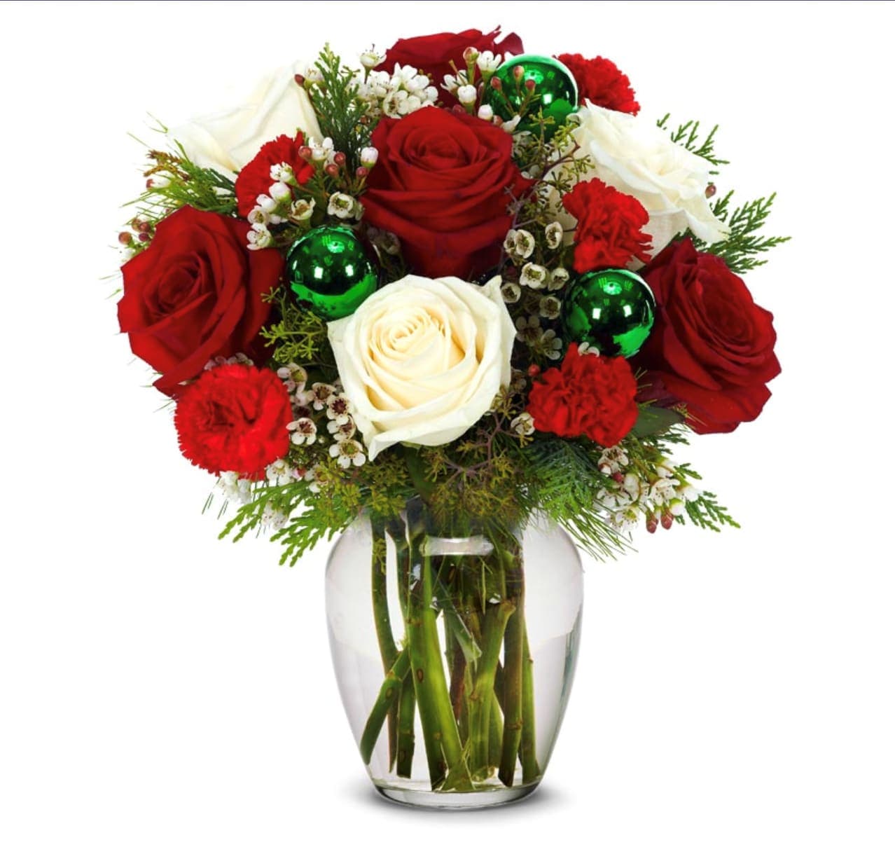 Jolly Holiday Vase - This beautiful Christmas or holiday vase arrangement includes an assortment of red and white roses, carnations and greenery. No holiday arrangement is complete without several ornaments! Ornament colors may vary.
