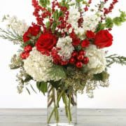 Holiday Cheer Buquet - classic tall Christmas arrangement with Christmas greenery and white / red flowers like roses , lilies, berry , mum 