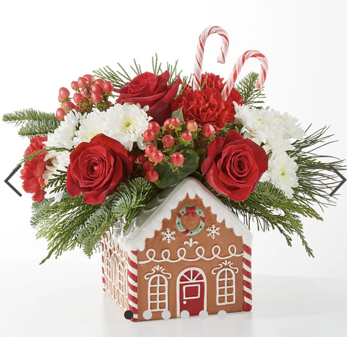 Gingerbread Bakery Bouquet - GINGERBREAD BAKERY BOUQUET  Share warmth and love with the Gingerbread Bakery Bouquet, a delectable blend of white and red stems, sure to have you dreaming of cinnamon, nutmeg and cloves. DETAILS  The Deluxe Bouquet is approximately 11"H x 12"W. Designed by florists, ready to display. For long–lasting blooms, replace the water daily. We suggest trimming the stems every couple days. Pet Safety Precautions: This bouquet or plant may include flowers and foliage that are known to be toxic to pets. To keep them safe, be sure to keep this arrangement out of your pet's reach. BLOOM DETAILS  Carnation Rose Hypericum Berry Christmas Greens