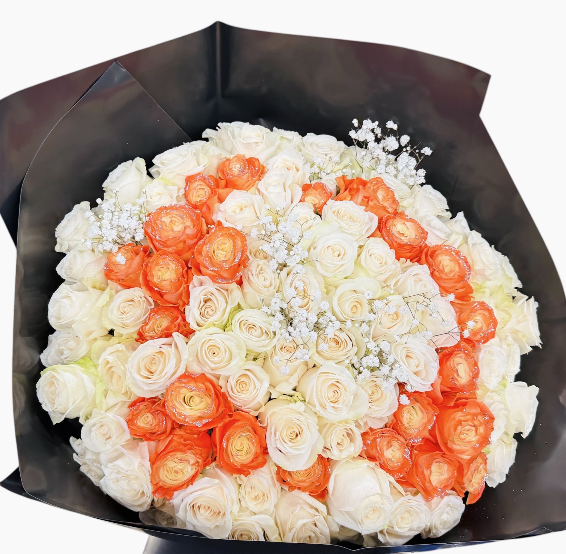 Ivory Ember - A lush harmony of creamy white 101 roses ignited by warm coral blooms. Soft elegance meets bold passion, wrapped in quiet luxury.