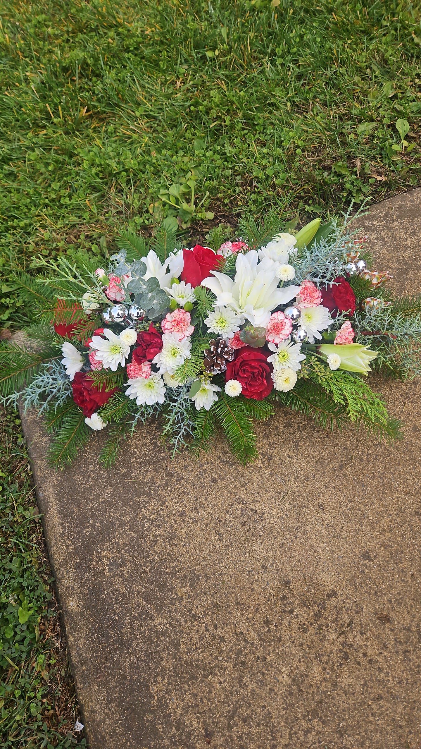 Katey's Christmas Centerpiece - Long and low centerpiece for Christmas with Christmas greens and fresh flowers and Christmas decor. 
