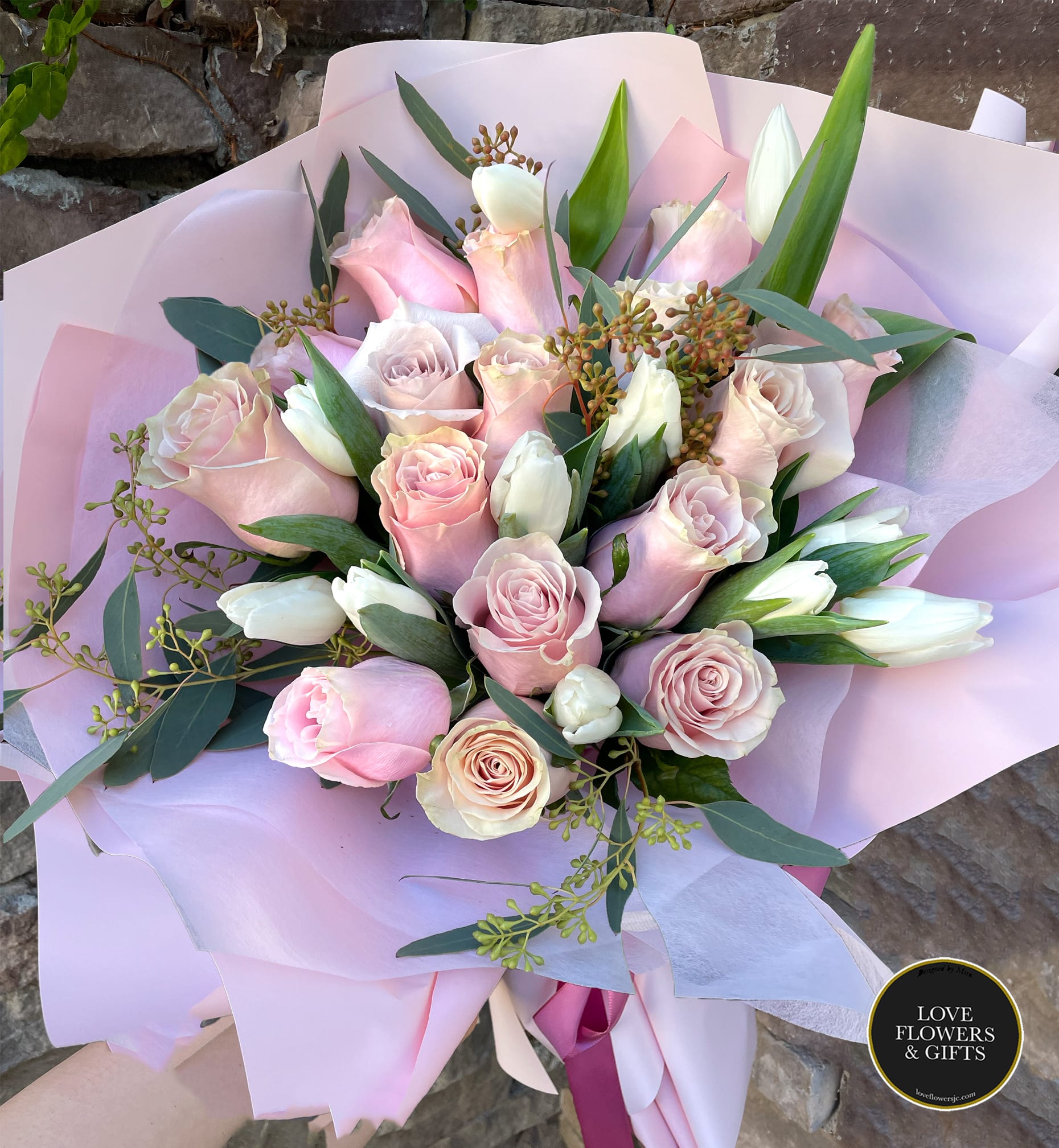 Blushing (Wrapped Bouquet)  - Lovely blushy roses and white tulips. Wrapped in high-quality korean floral paper and tied with a satin ribbon. (Vase is not included, flowers are wrapped in water pocket for longer freshness.)  Great for all kinds of occasions and beautiful people :)