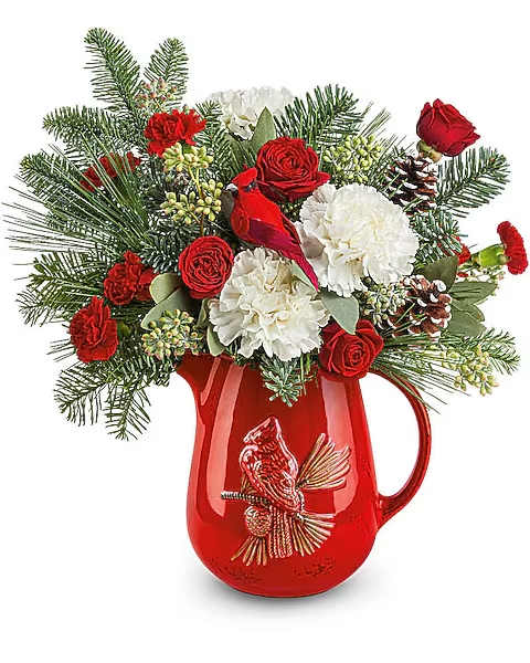 Scarlet Cardinal Bouquet - Scarlet Cardinal Bouquet brings festive cheer with red and white blooms, lush greens, and a charming cardinal pitcher. A perfect Christmas gift or seasonal centerpiece full of nostalgic warmth. Scarlet Cardinal Bouquet includes red spray roses, white carnations, red miniature carnations, seeded eucalyptus, noble fir, and white pine-arranged in the keepsake Scarlet Cardinal Pitcher.