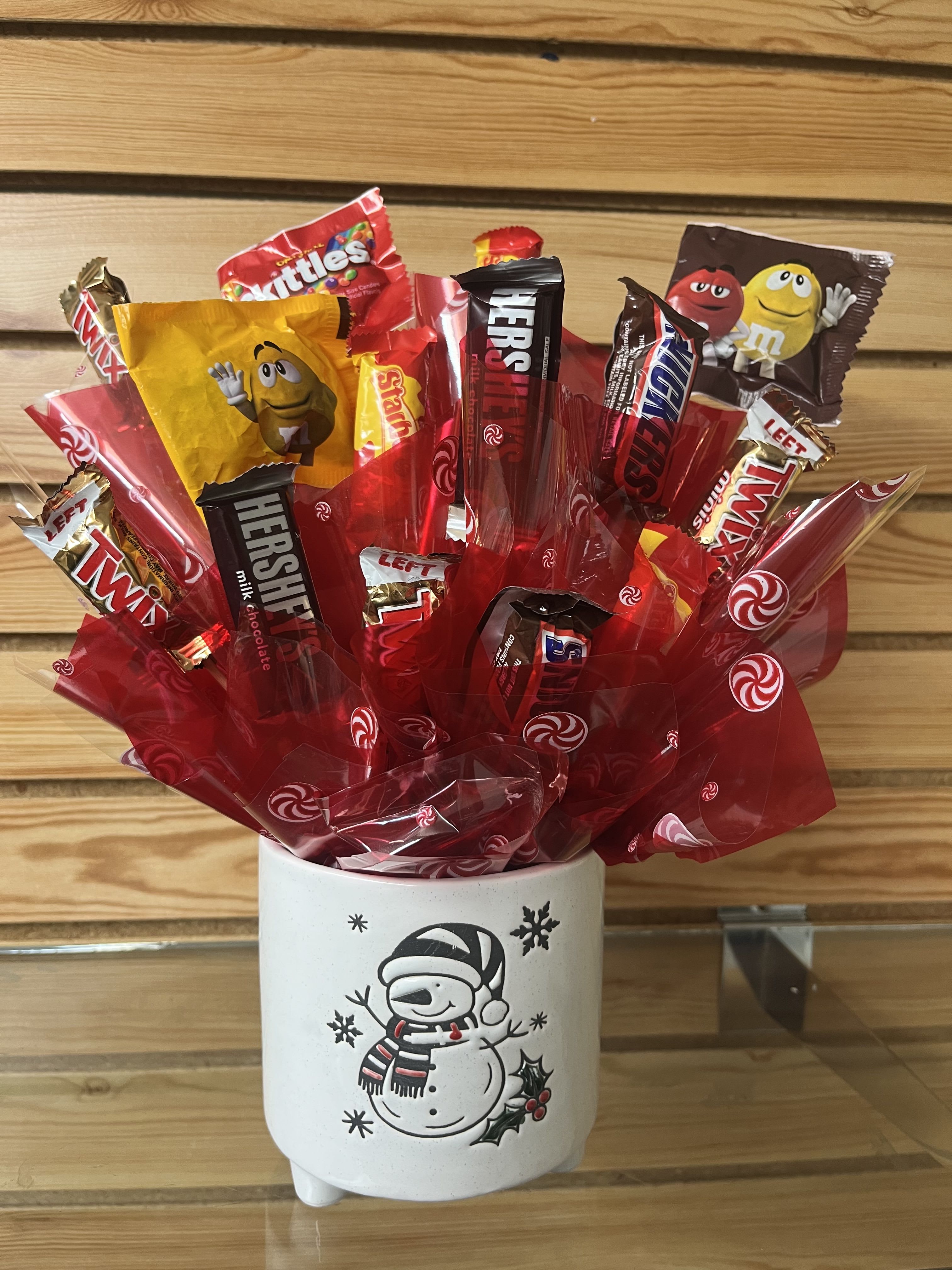 Sweet Snowman - A snowman container with a fun selection of candy!