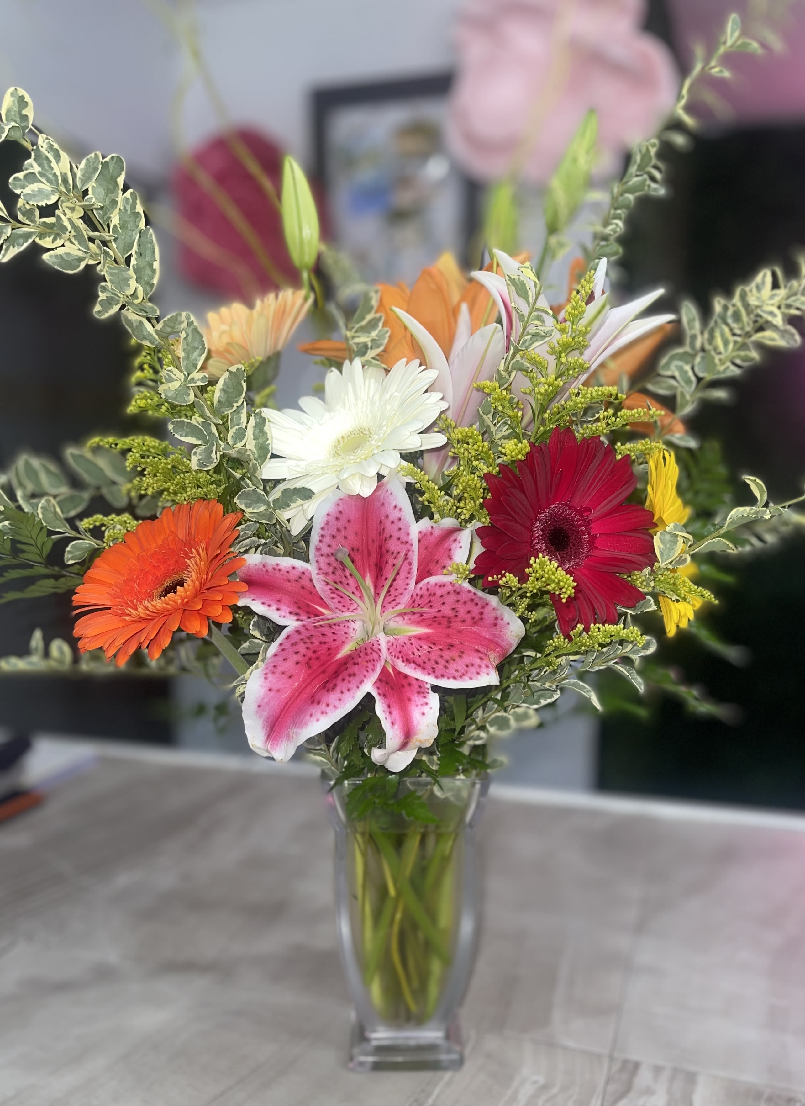 Designer's Choice Vase Arrangement - Not sure what to order? Let our talented design team create a custom vase arrangement just for you! We use our freshest seasonal blooms to design an arrangement perfect for you. Thank you for you trust in letting our designers choose a lovely gift for the person you care about!     *If this arrangement is for a funeral or memorial service, we will thoughtfully our designer will modify the color palette to ensure it is appropriate for the service. 