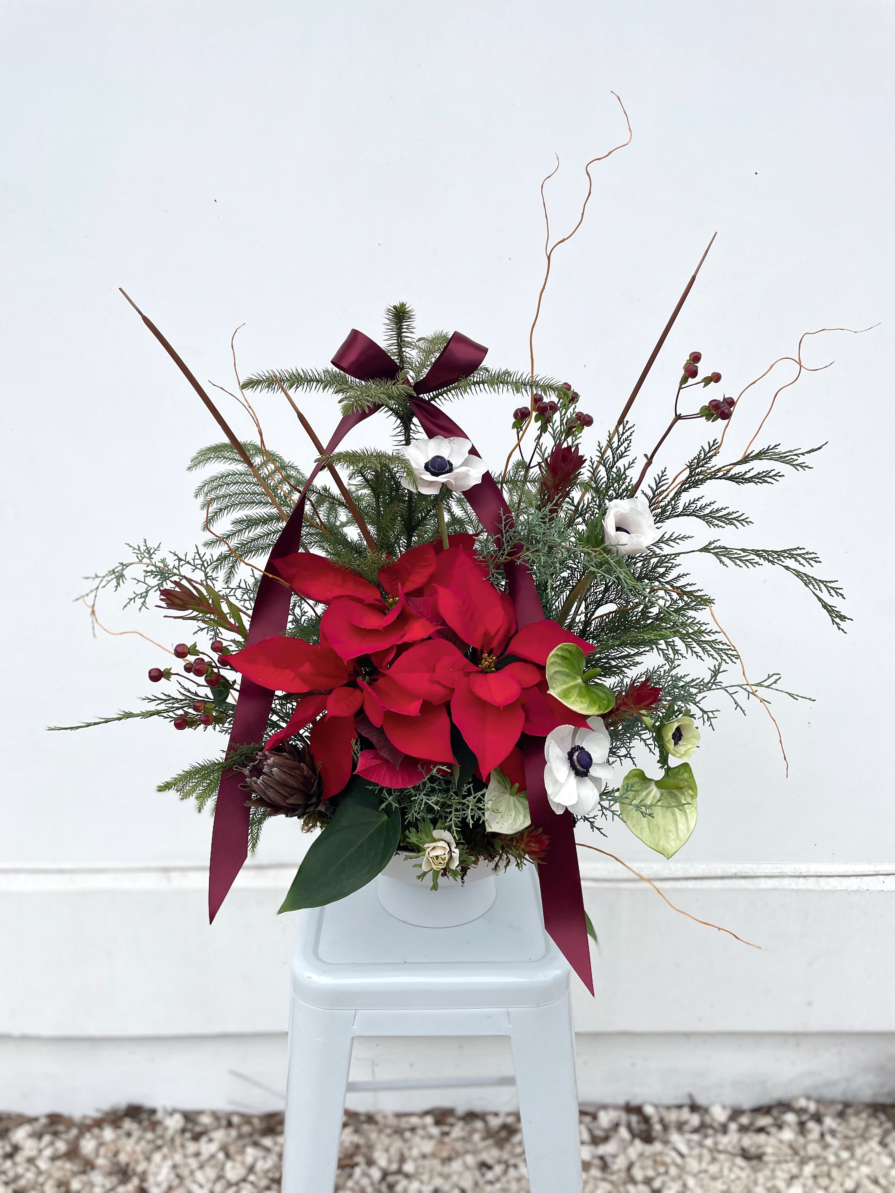 Woodland Fairy - Meet the Woodland Fairy — our new favorite potted plant. Made to order and fully customizable, each arrangement features a rotating mix of festive accent flowers and holiday plants, making every piece beautifully unique.   *** Pricing for this size starts at $275. Smaller options are available by phone—just give us a call! ***