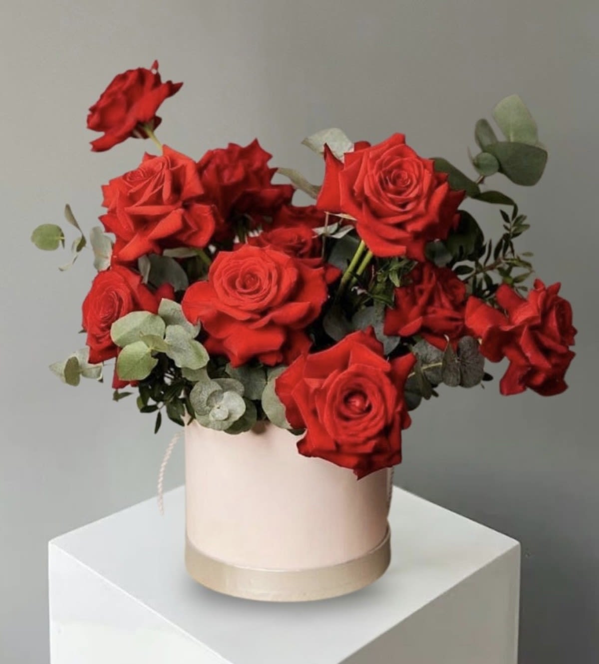 Passion Petals  - This romantic floral arrangement features lush red roses arranged in full bloom, symbolizing passion, devotion, and heartfelt emotion. Perfect for celebrating love and meaningful moments.