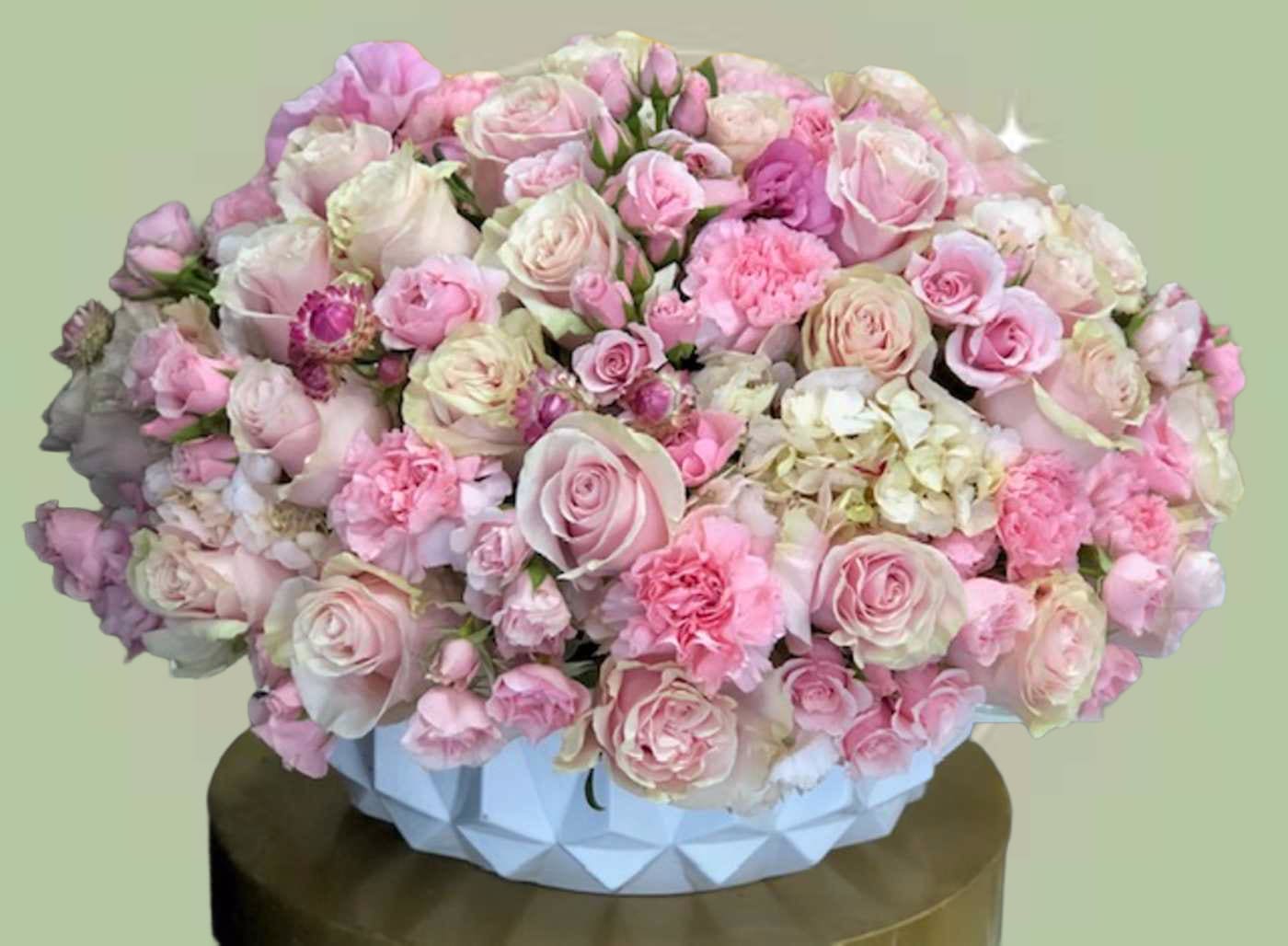 Pink Me Up - PLEASE NOTE: Although we make all the effort to create a floral arrangement as close to the photo shown, the actual arrangement delivered may vary slightly in its appearance from the photo shown. If you have any questions about your order, we welcome you to call us in or email us to discuss further. Thank you!